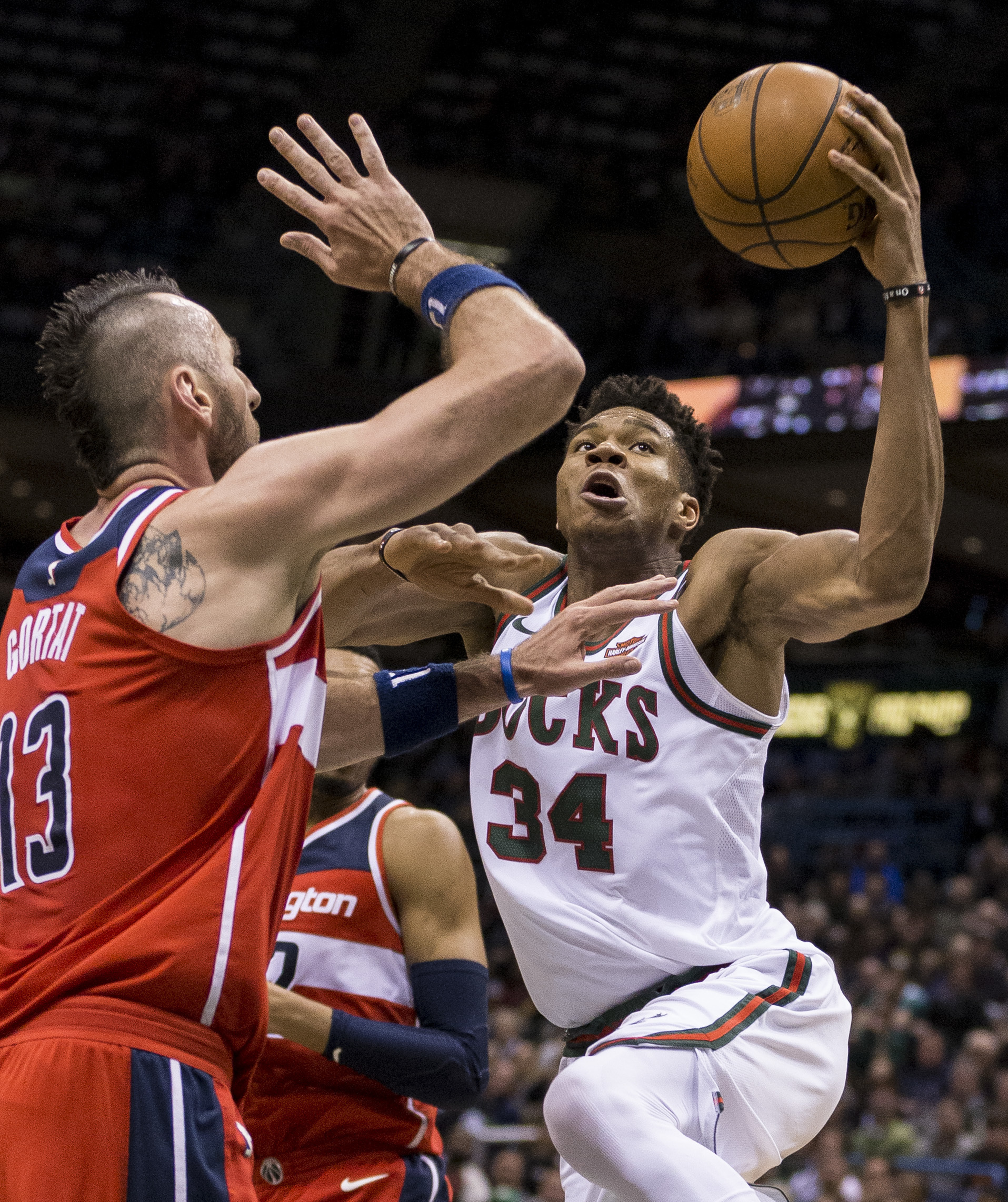 Beal, Potter lead Wizards past Bucks 107-104