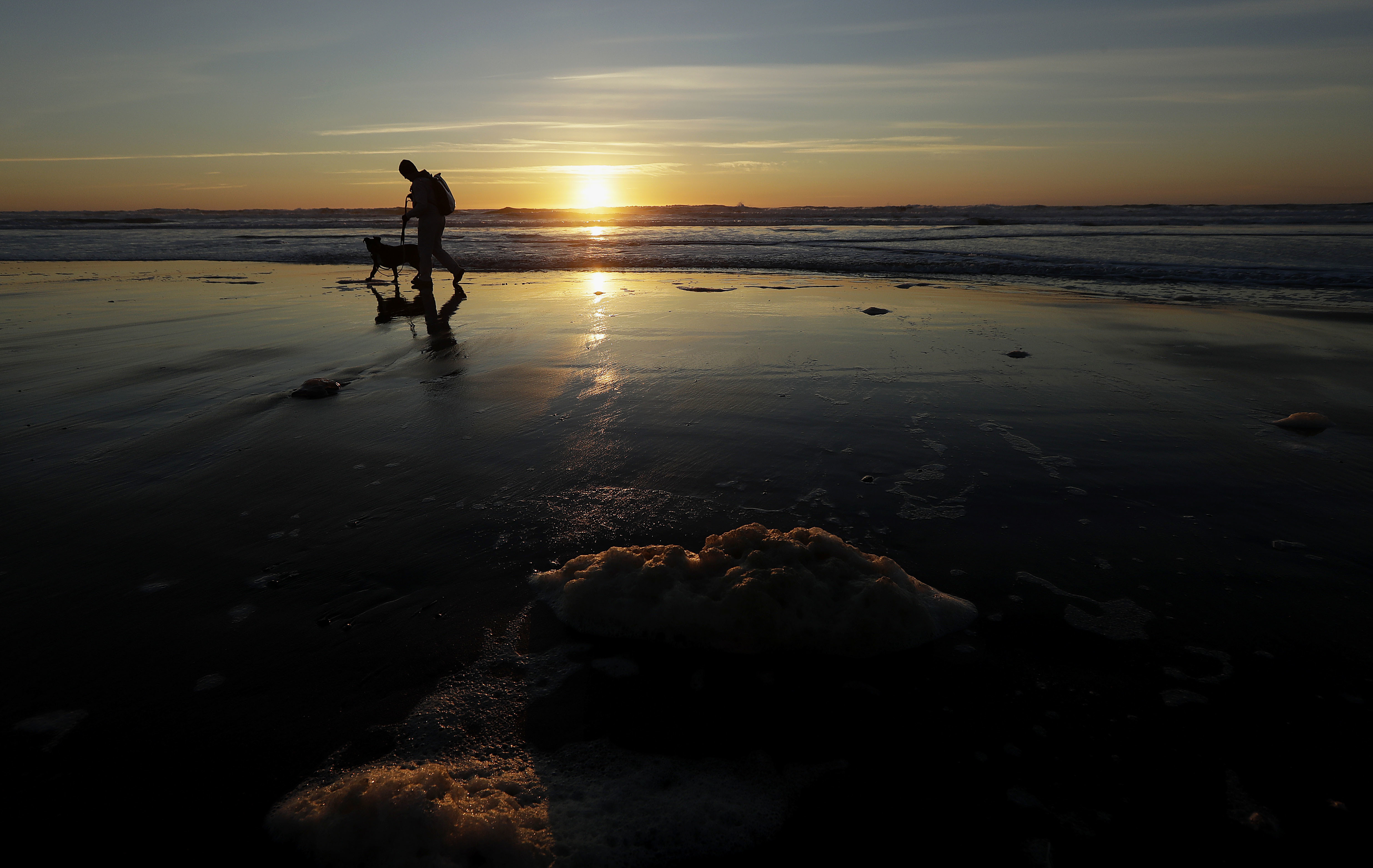 The Latest: Major California storm could hit burn areas