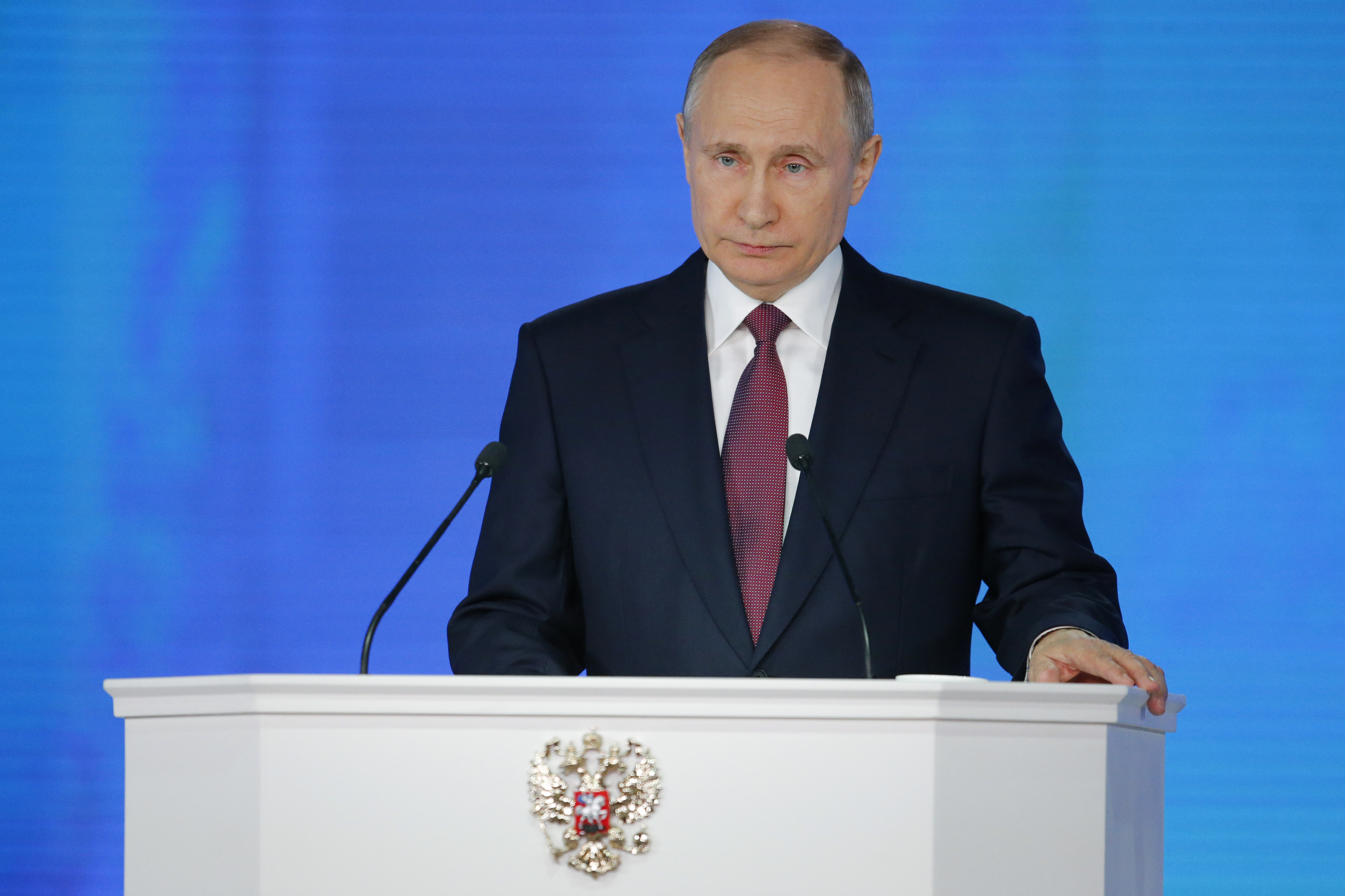 Putin boasts of new weapons, vows to boost living standards