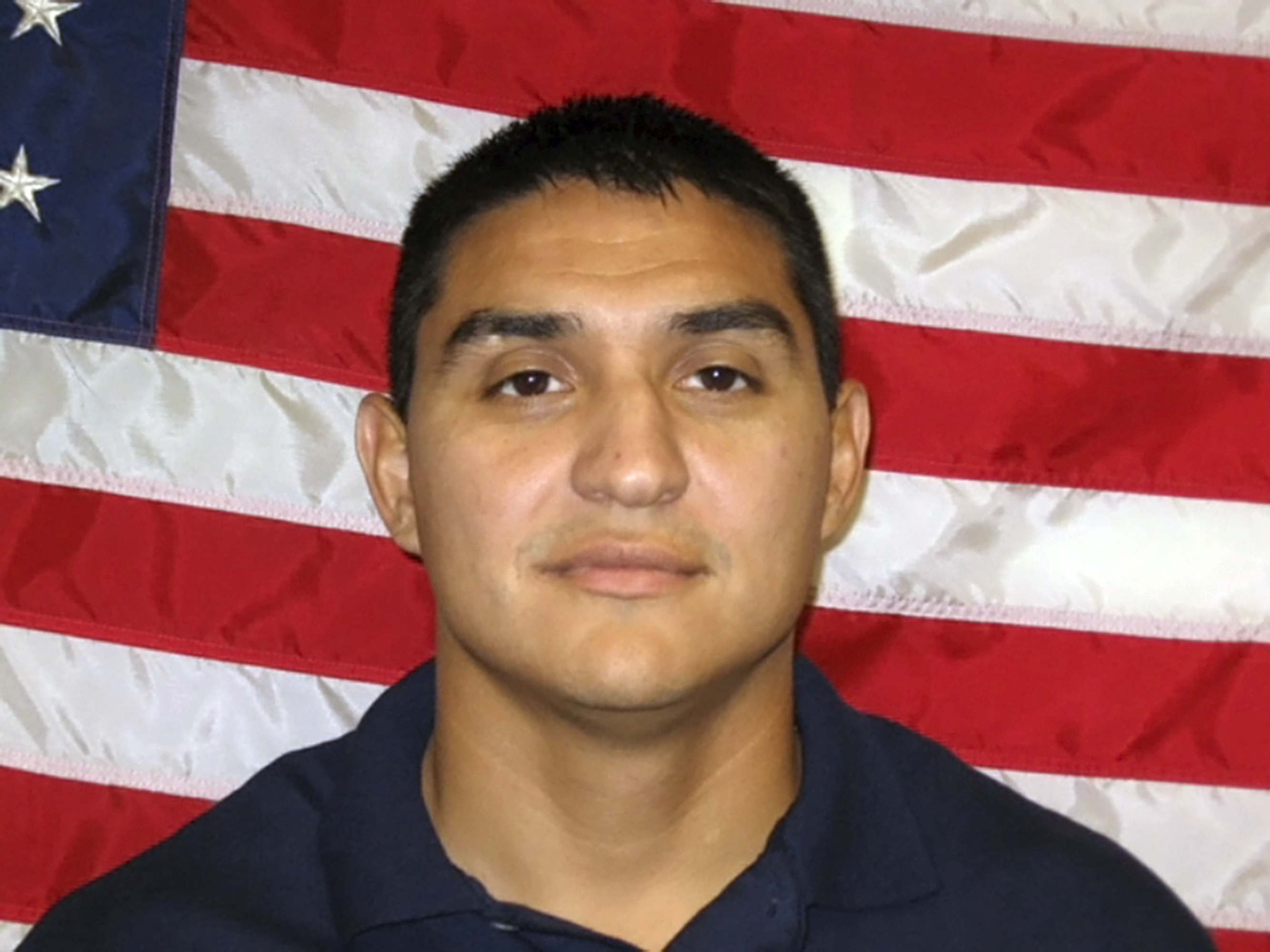 Officials say marshal slain on duty was hit by friendly fire