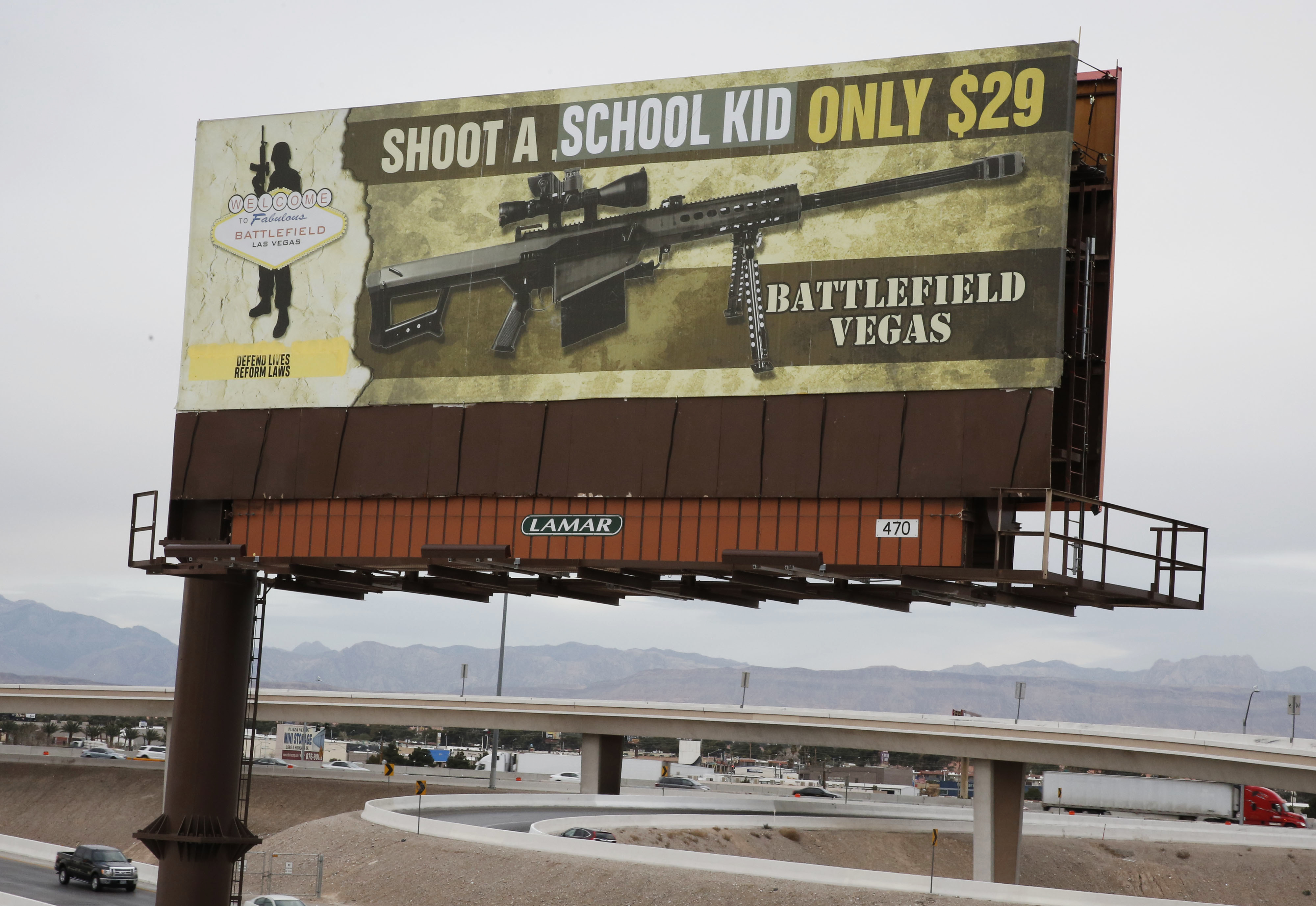 The Latest: Group says it alerted billboard over gun debate
