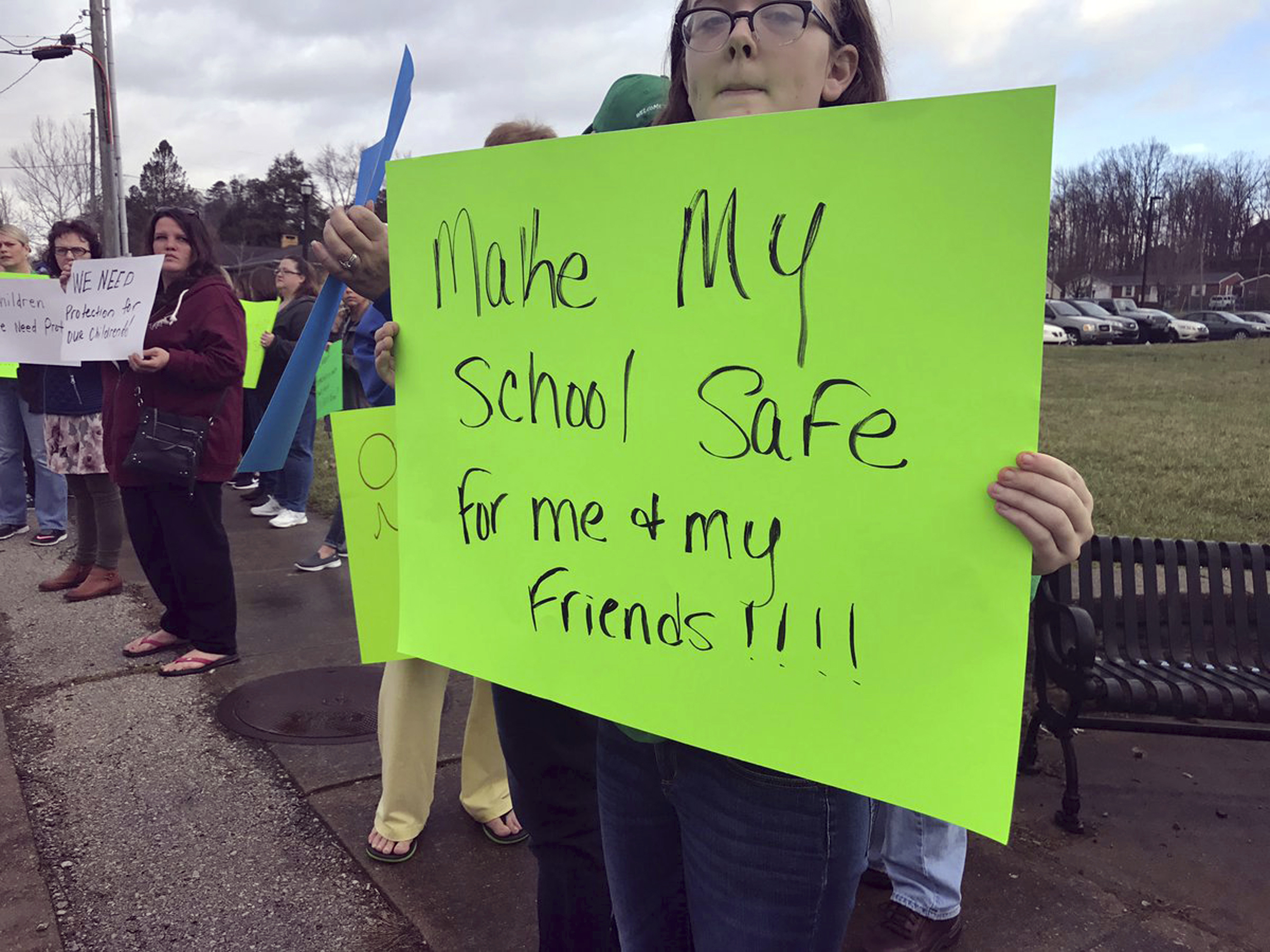 This Feb. 21, 2018 photo made available by Lex18 News, shows a group protesting school safety in Laurel County, KY. In the wake of a mass shooting at a Florida high school, parents and educators are mobilizing to demand more school safety measures, including armed officers, security cameras, door locks, etc. (Photo: Claire Crouch/Lex18News via AP)