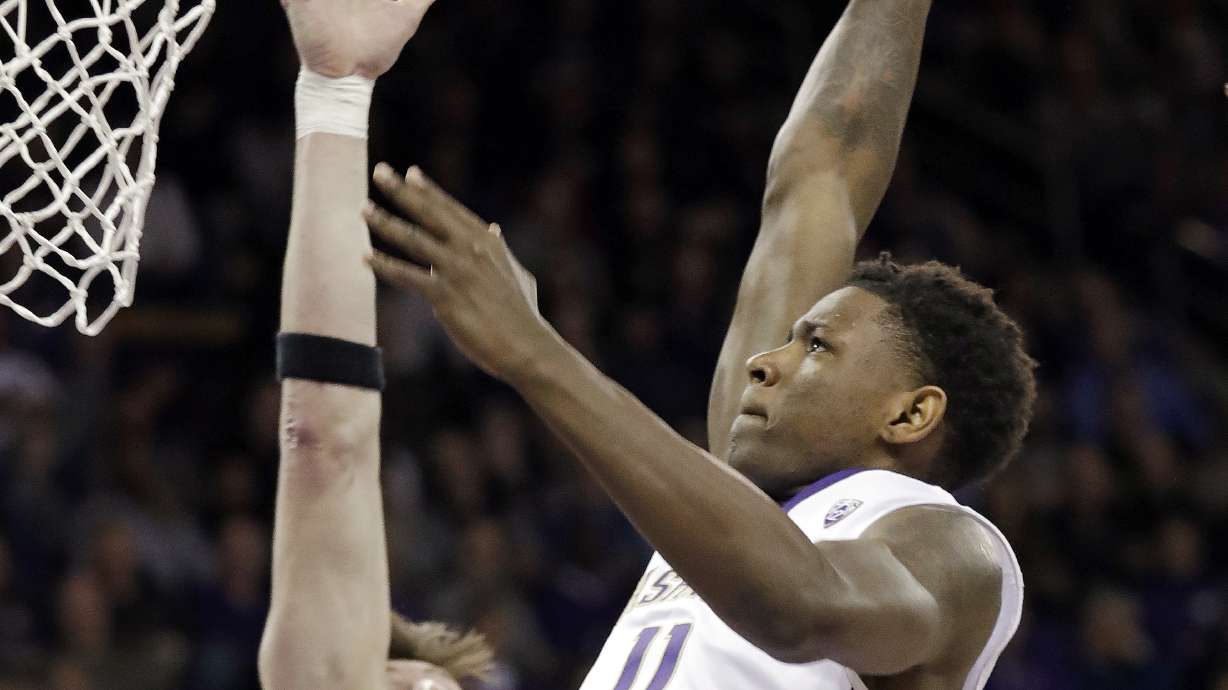 Dickerson helps Washington edge Oregon State 79-77