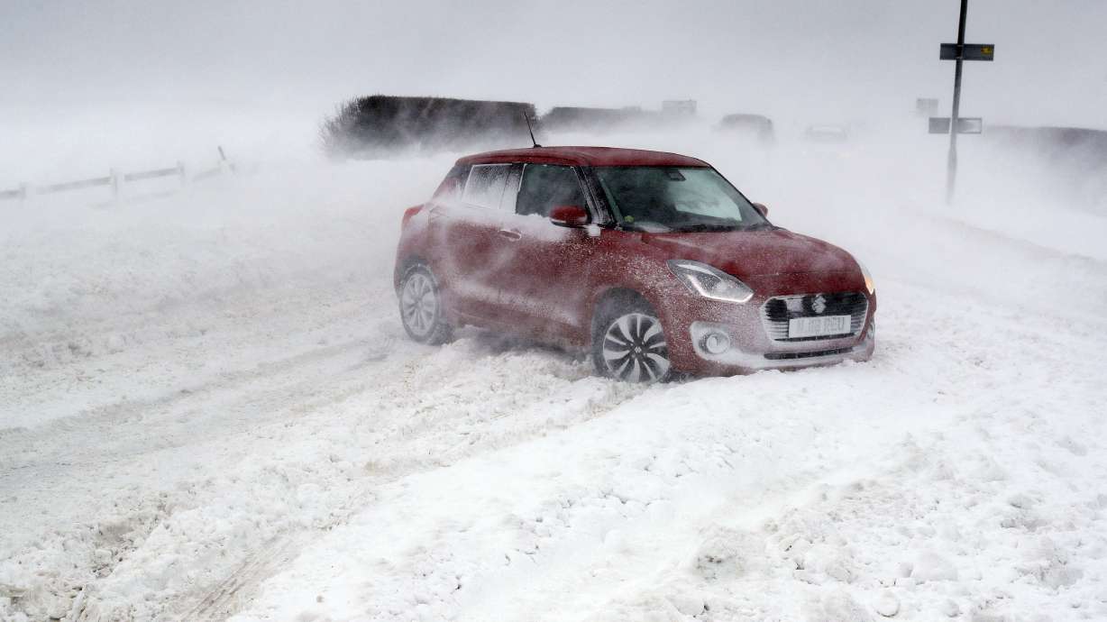 Europe weather: UK army sent out; Dutch ice skate on canals