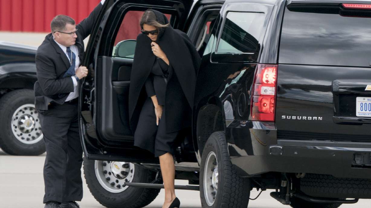 The Rev. Billy Graham's family brings his casket into tent filled with mourners to start the evangelist's funeral