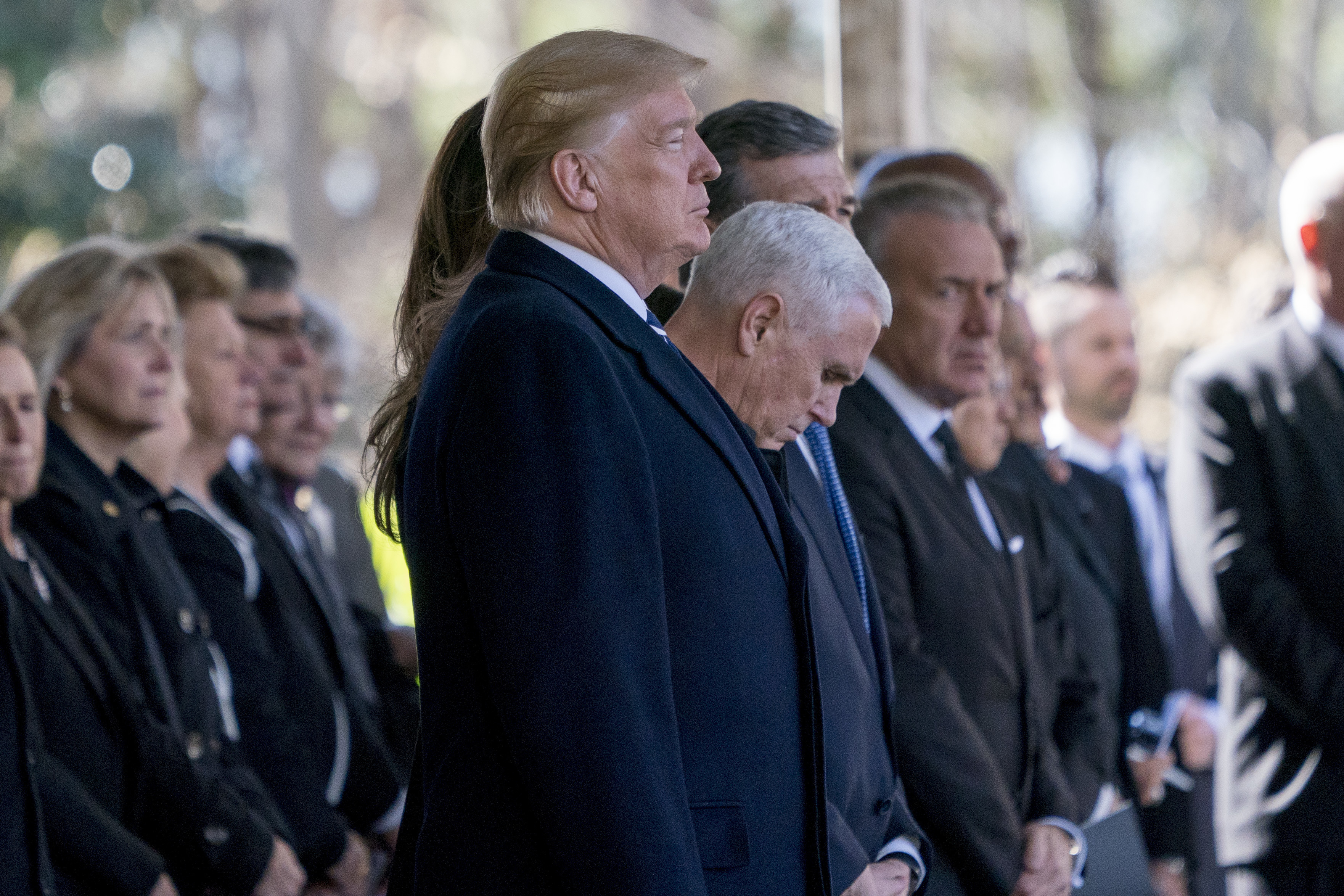 President Donald Trump and Vice President Mike Pence, center right, arrive at the funeral of Reverend Billy Graham in Charlotte, N.C., Friday, March 2, 2018. (AP Photo/Andrew Harnik)