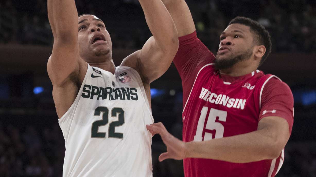 No. 2 Michigan State wins 13th in row, beats Wisconsin 63-60