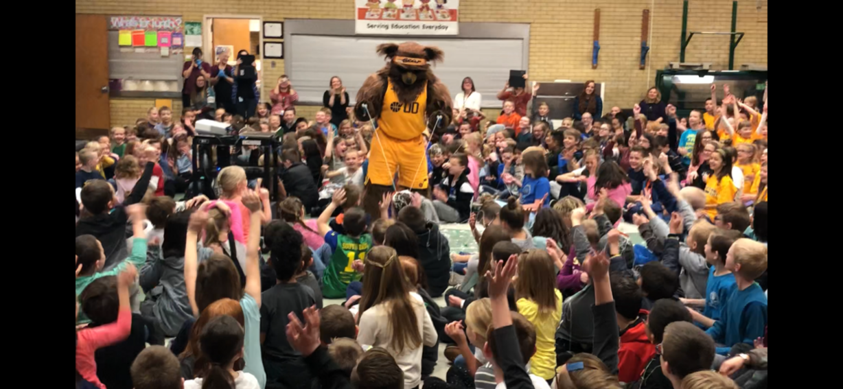 The Utah Jazz bear visits students at Valley View Elementary School in Bountiful during a school assembly about the musical "Our Home Court," based on the life of Gail and Larry Miller, which the school is staging this week. (Photo Courtesy of Brent Morley)