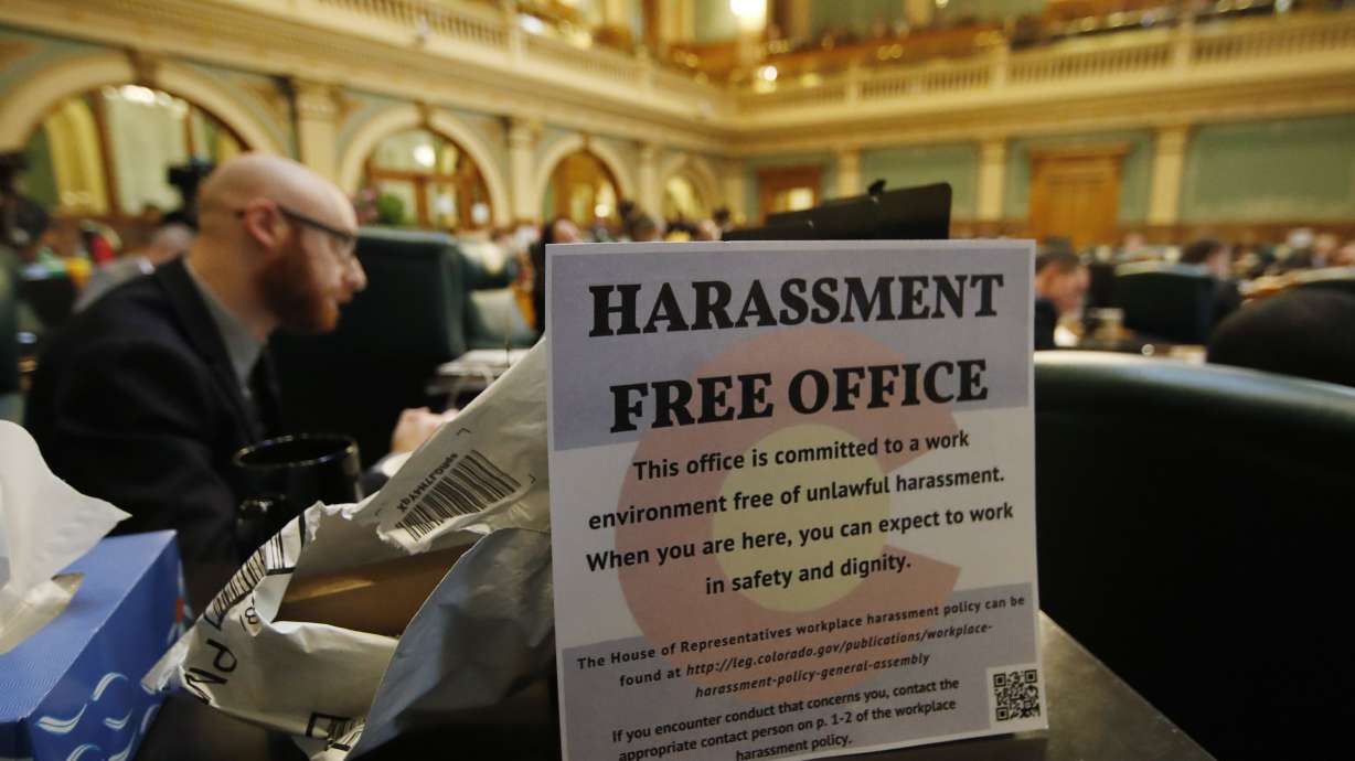 The Latest: Expelled Colorado lawmaker switches parties