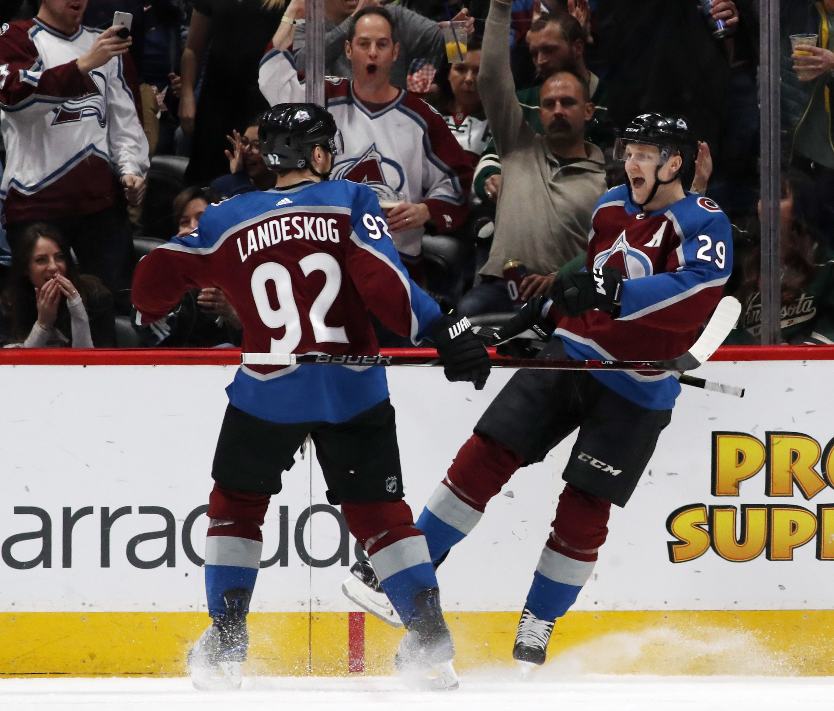 MacKinnon has 5 points in Avs' 7-1 rout of Wild