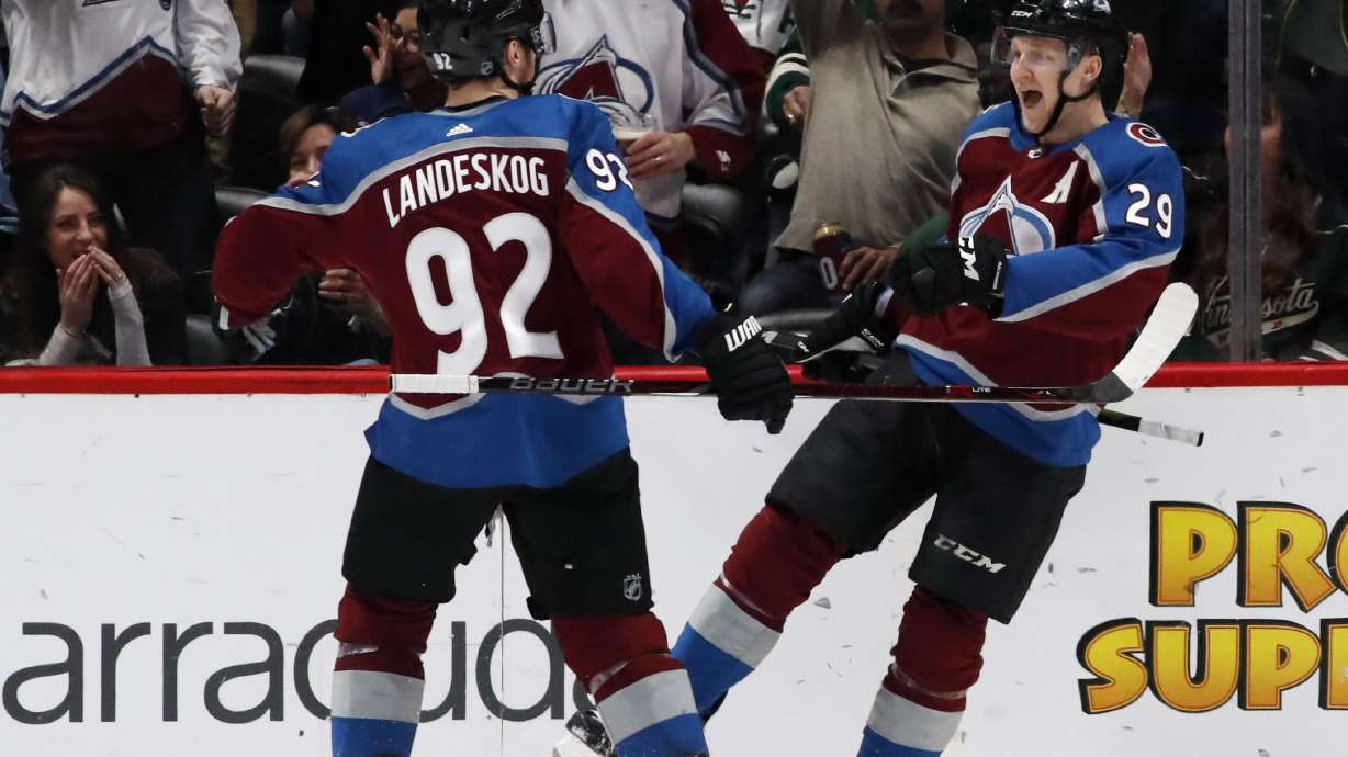 MacKinnon has 5 points in Avs' 7-1 rout of Wild