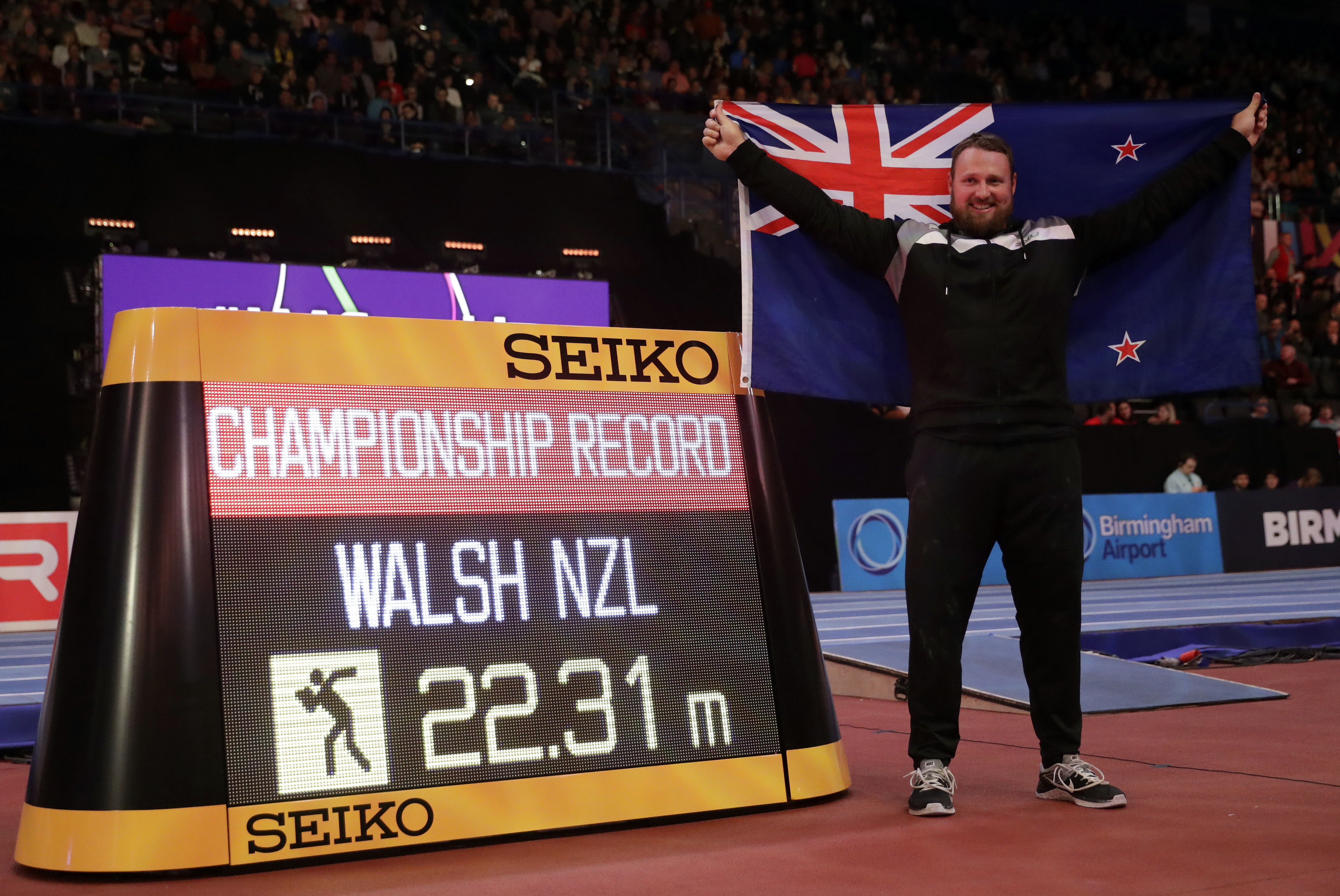 Walsh wins shot put and bet with record indoor worlds throw