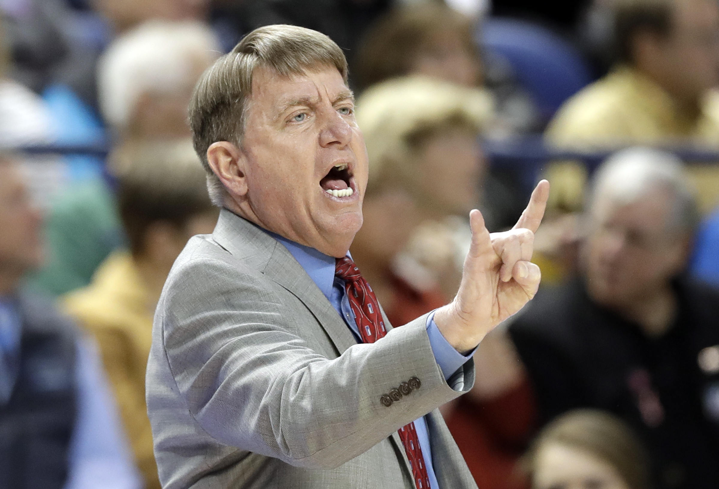 No. 4 Louisville tops No. 23 NC State 64-59 in ACC semis