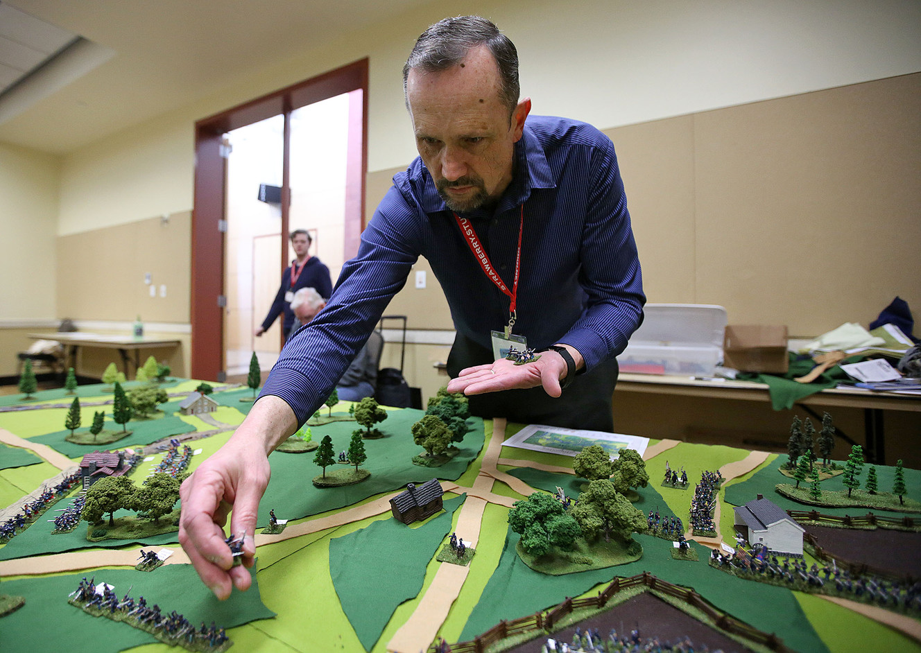 Matt Irsik lines up Civil War figures for the game Fire and Fury at the SaltCON Board Game Convention at the Davis Conference Center in Layton on Thursday, March 1, 2018. (Photo: Kristin Murphy, KSL)