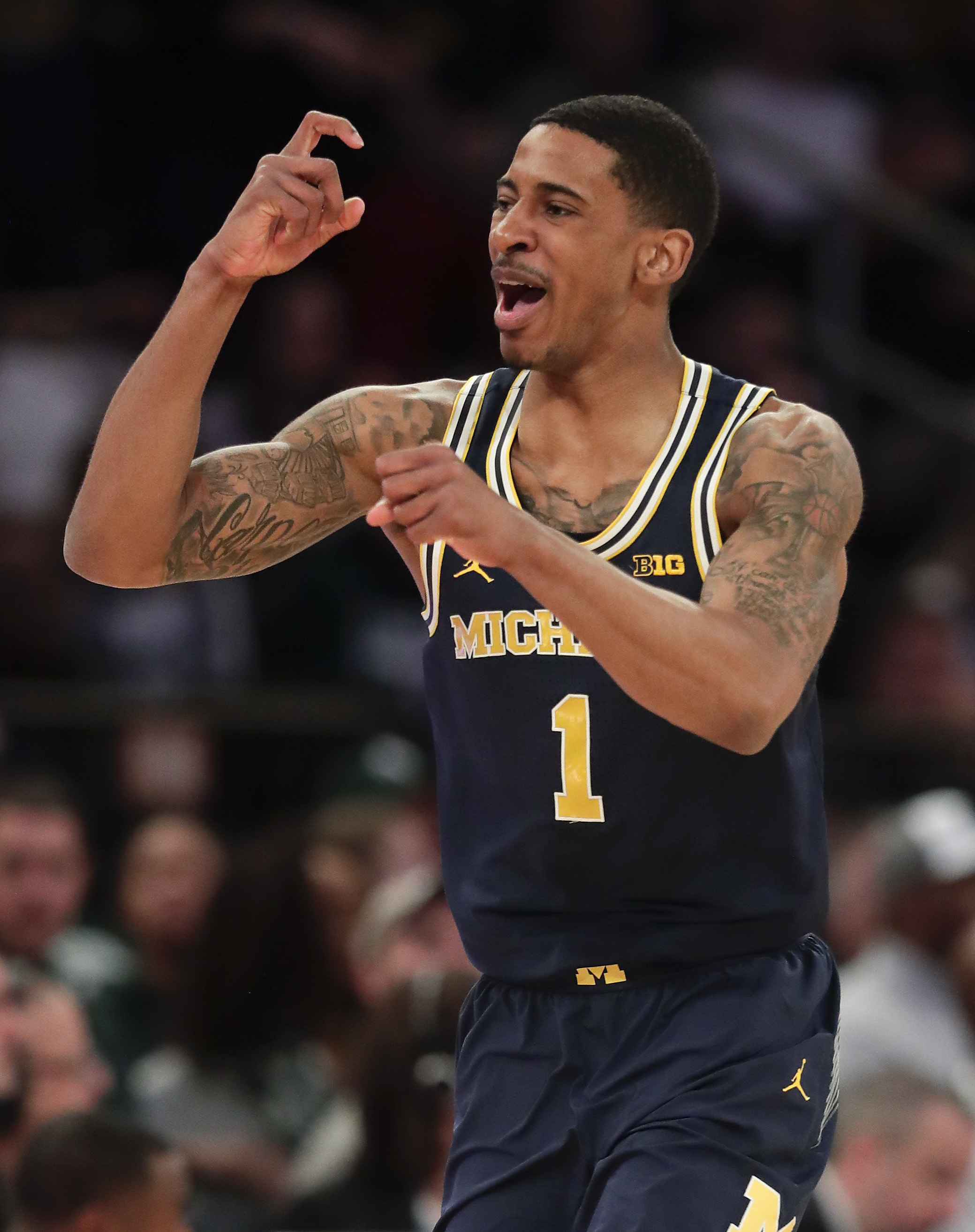 Michigan ends top-seeded Spartans' 13-game winning streak