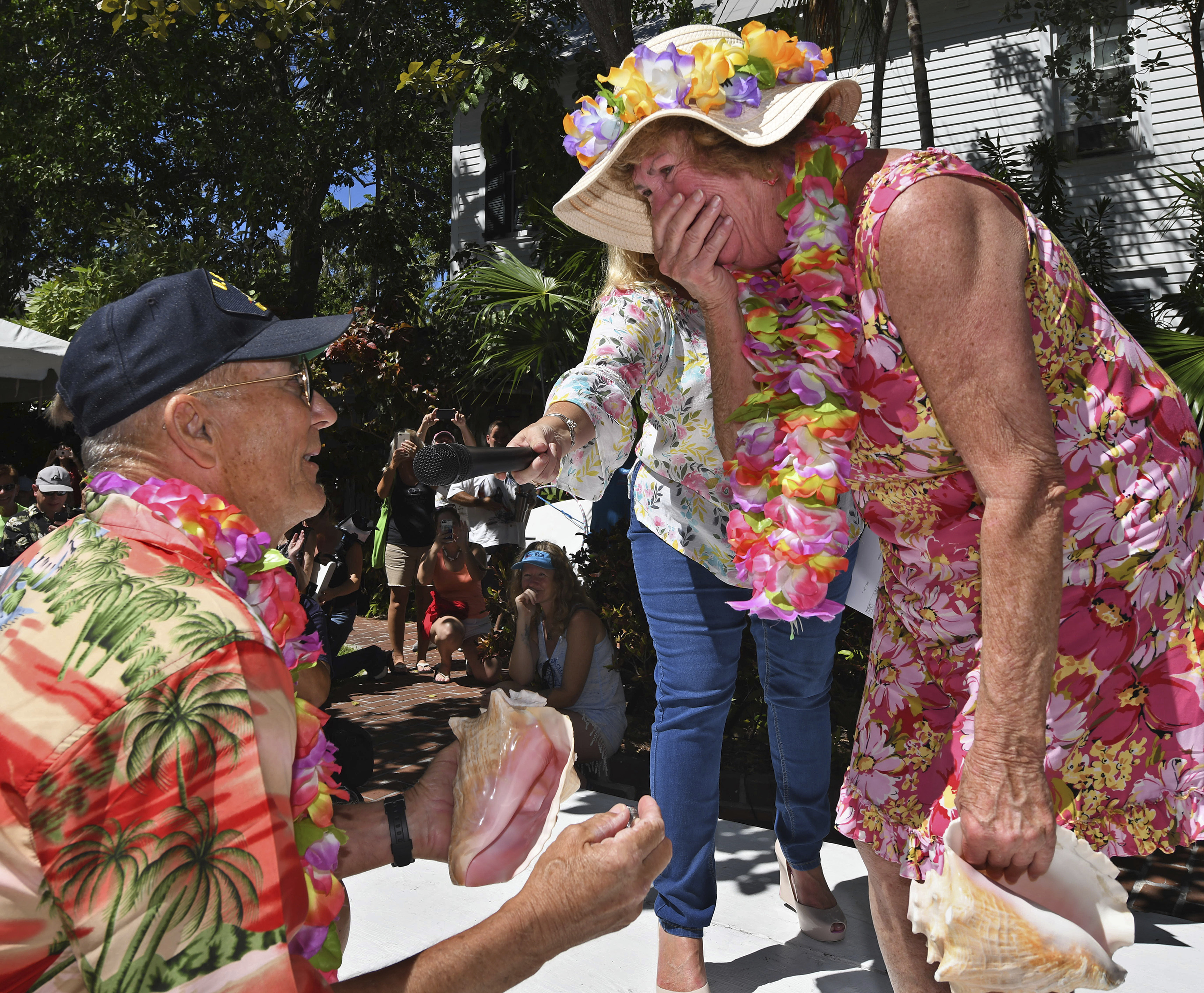 Woman wins Keys conch-blowing contest; accepts proposal