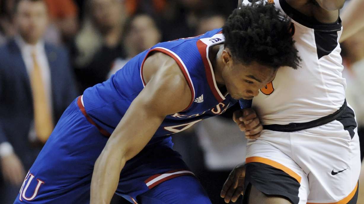 Smith, Solomon lead Okla. State to big win over No. 6 Kansas