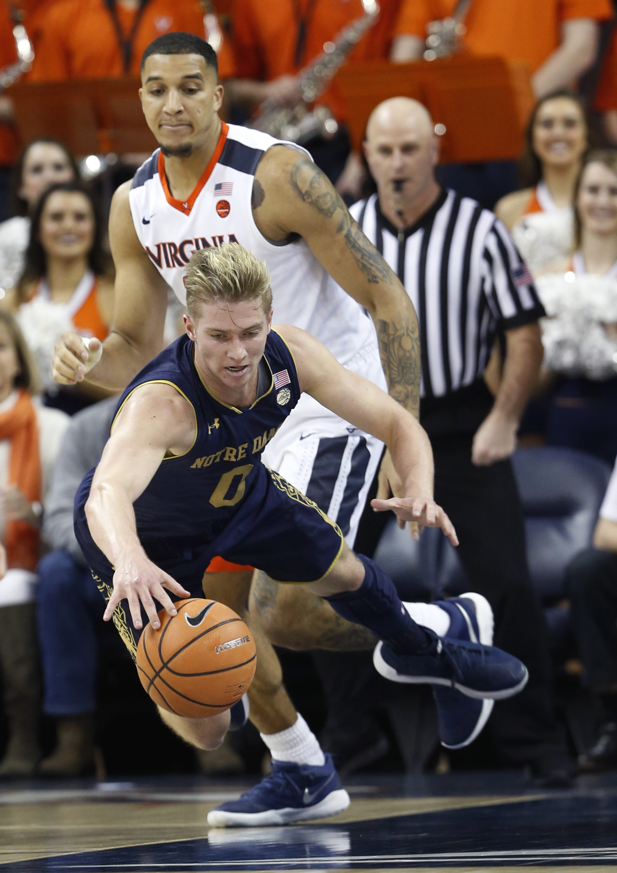 Hall's 17 lead No. 1 Virginia past Irish, 62-57
