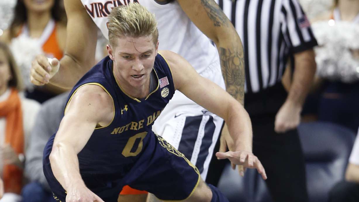 Hall's 17 lead No. 1 Virginia past Irish, 62-57