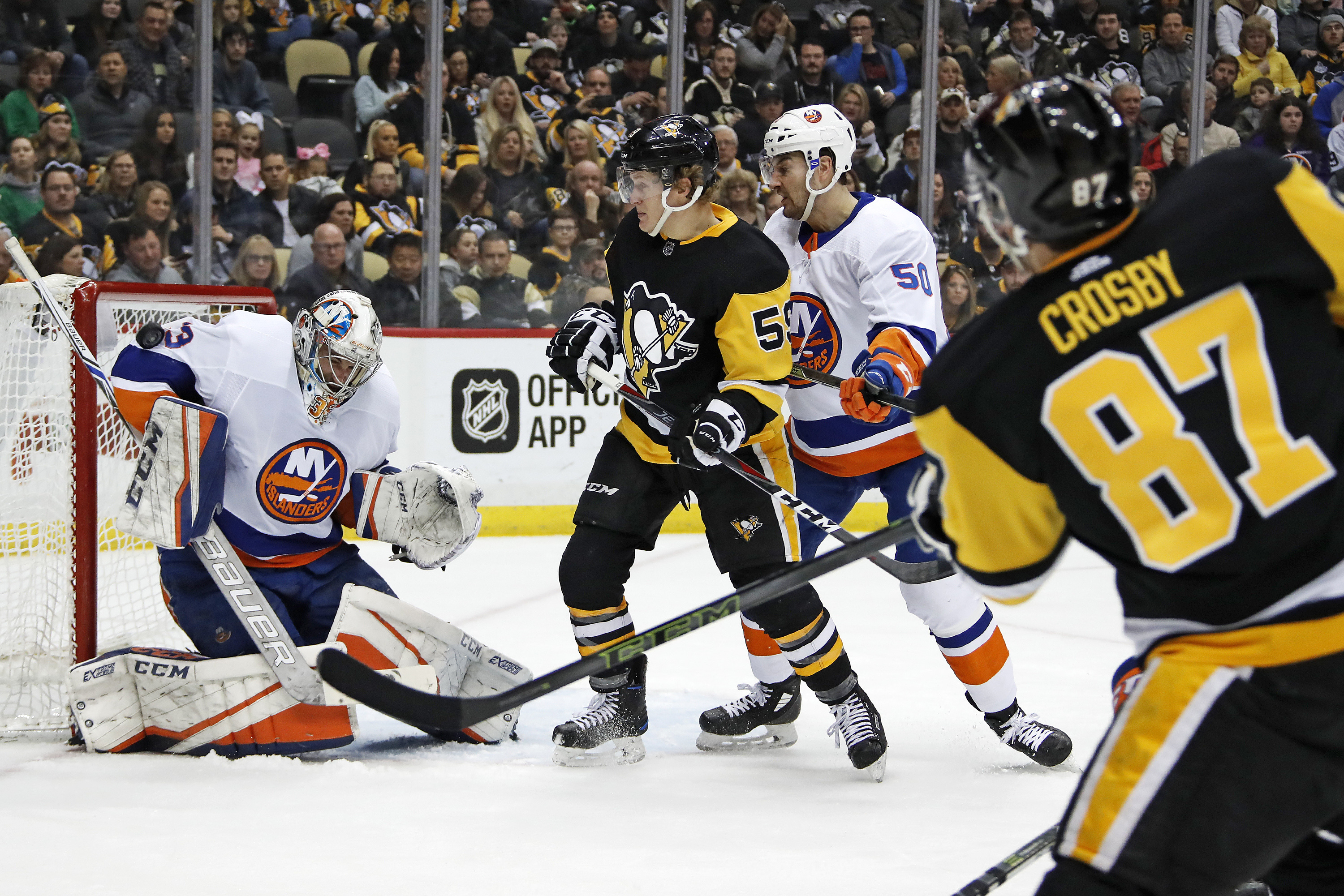 Crosby scores in OT, Penguins slip by Islanders 3-2
