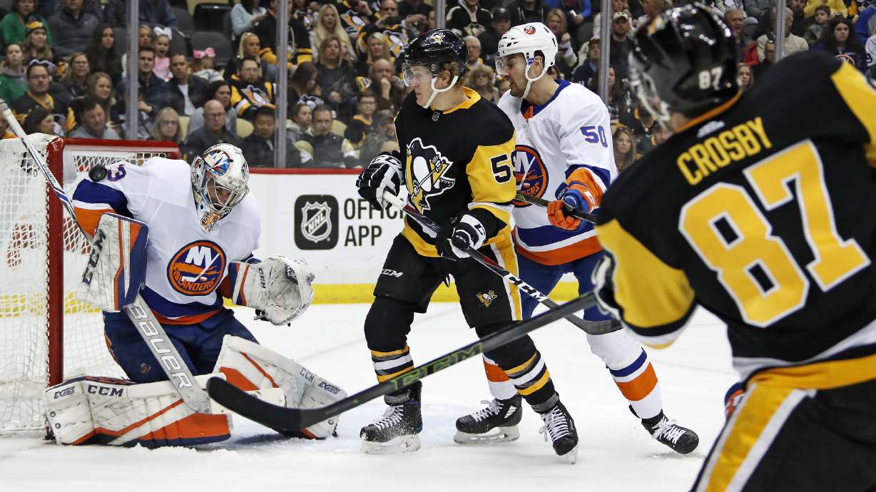 Crosby scores in OT, Penguins slip by Islanders 3-2