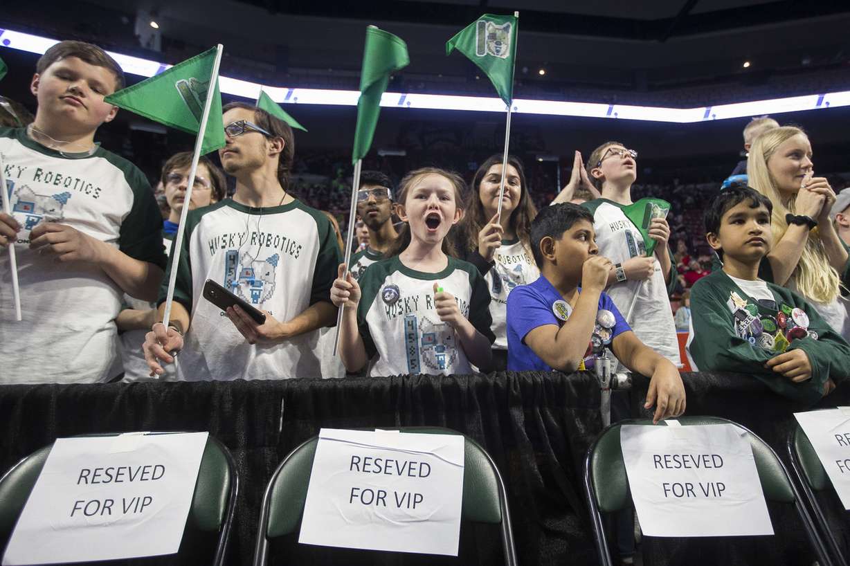 Riley-Ann Pennington, of Provo, 11, cheers for the Husky Robotics team from Hillcrest High School while the team competes during the FIRST Robotics Competition at the Maverik Center in West Valley City on Saturday, March 3, 2018. More than 70 schools took part in the Friday and Saturday competition. (Photo: Jacob Wiegand, KSL)