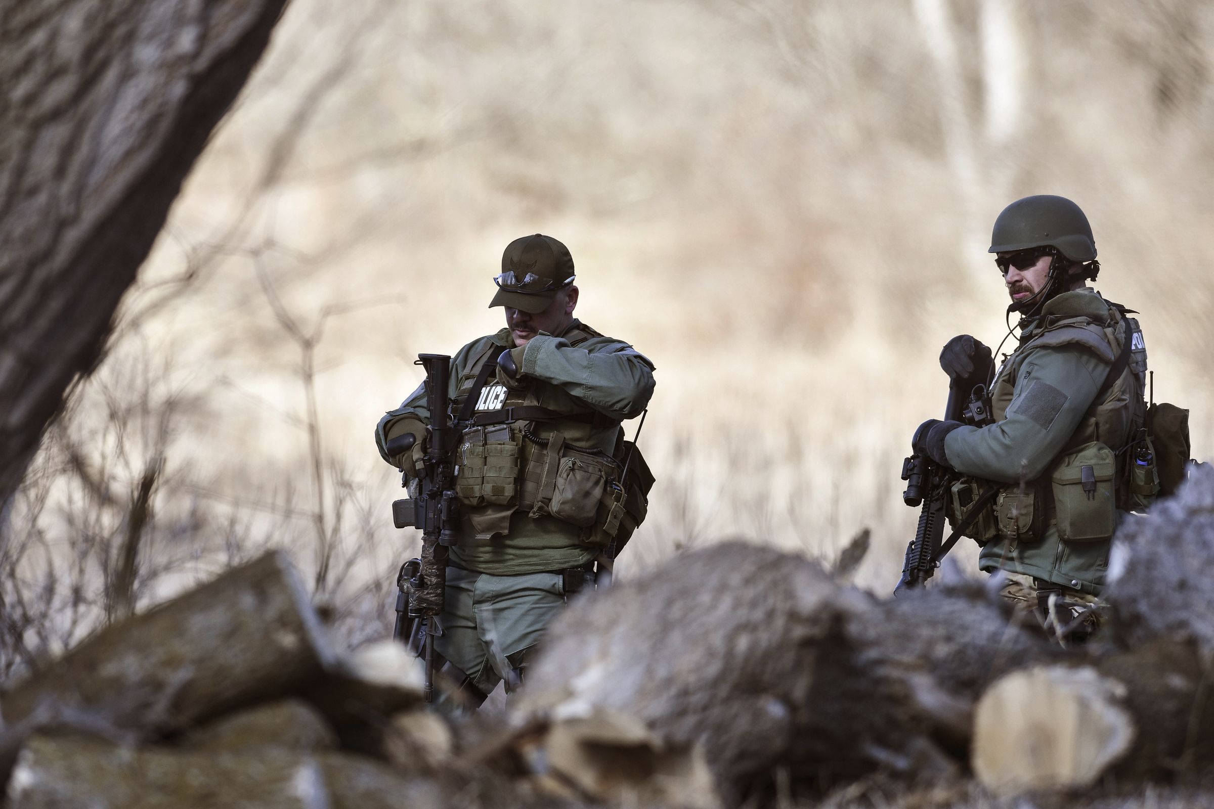 The Latest: Friend: Son of slain parents a 'good kid'