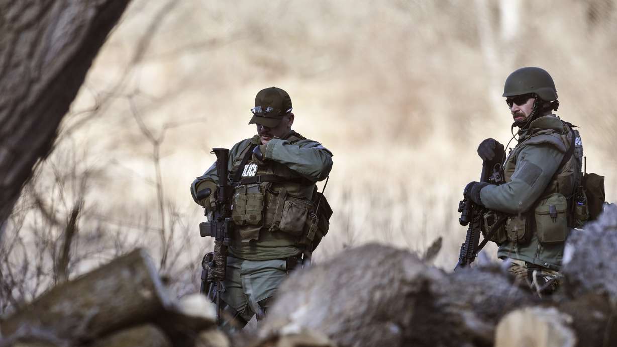 The Latest: Friend: Son of slain parents a 'good kid'