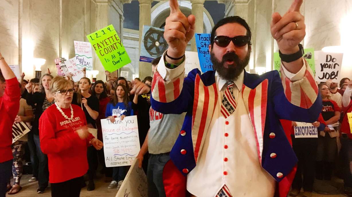 The Latest: Committee to mull West Virginia teacher pay hike