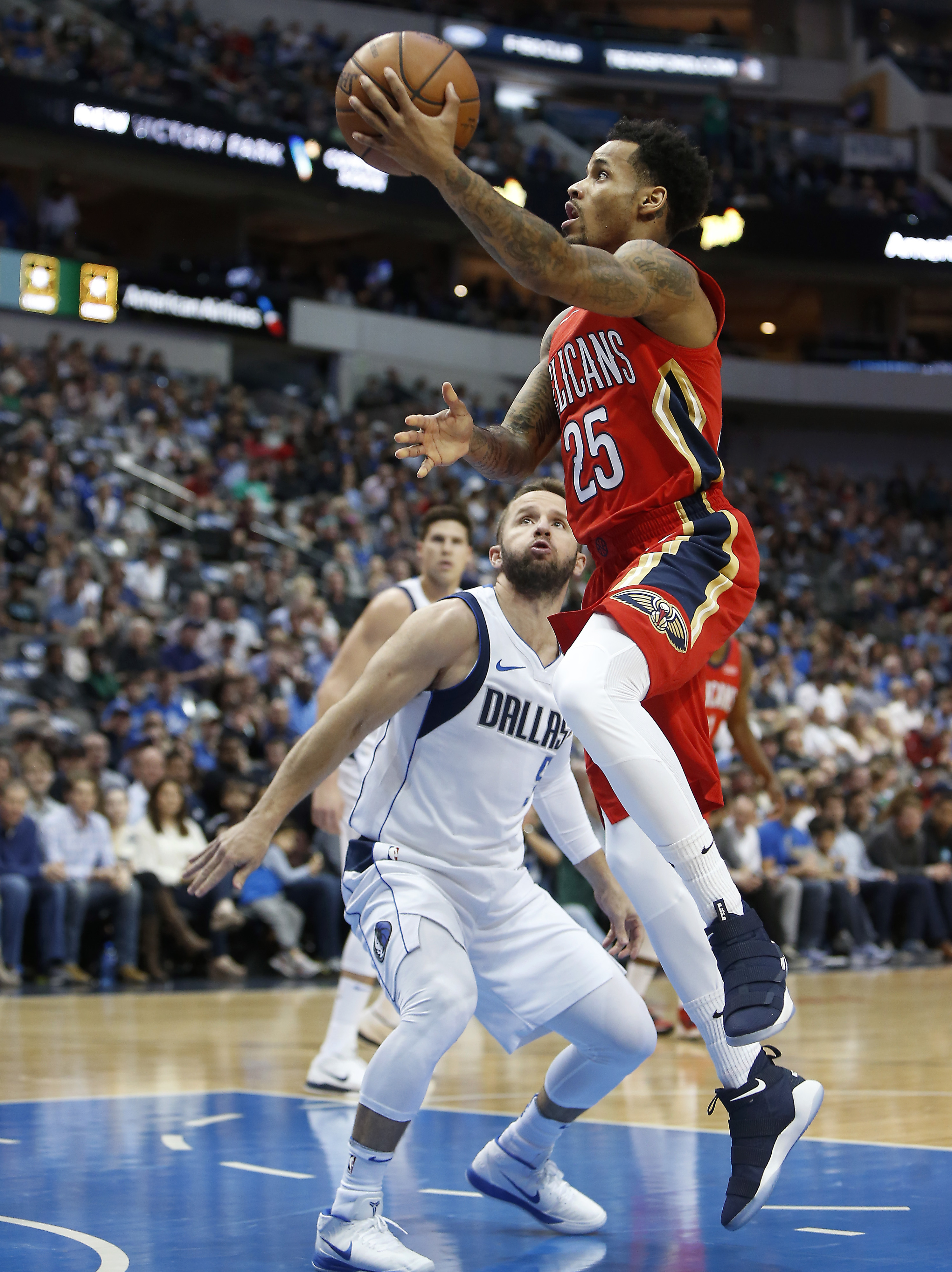 Holiday scores 30 as Pelicans beat Mavericks 126-109