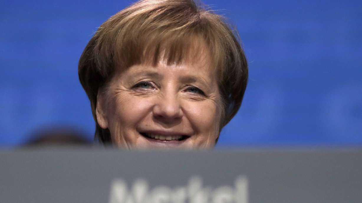 Merkel welcomes German govt deal, wants to dive into work