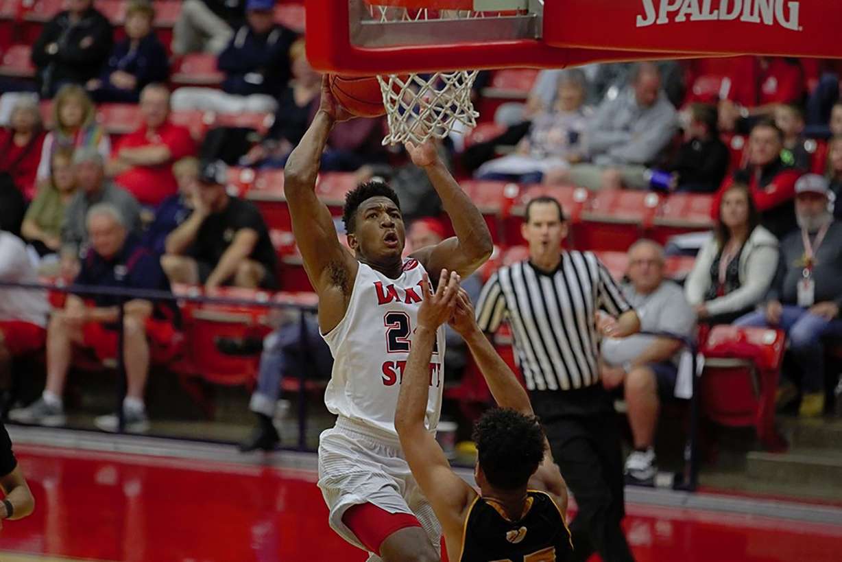 Dixie State senior guard Trevor Hill rises for two of his team-high 15 points in the Trailblazers' 71-52 victory over Dominican University in St. George. (Photo: Stan Plewe, Dixie State Athletics)