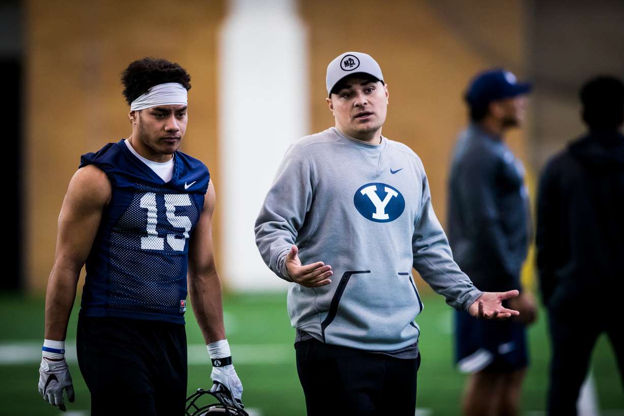 BYU wide receivers coach Fesi Sitake during spring football camp, March 5, 2018 in the indoor practice facility in Provo.