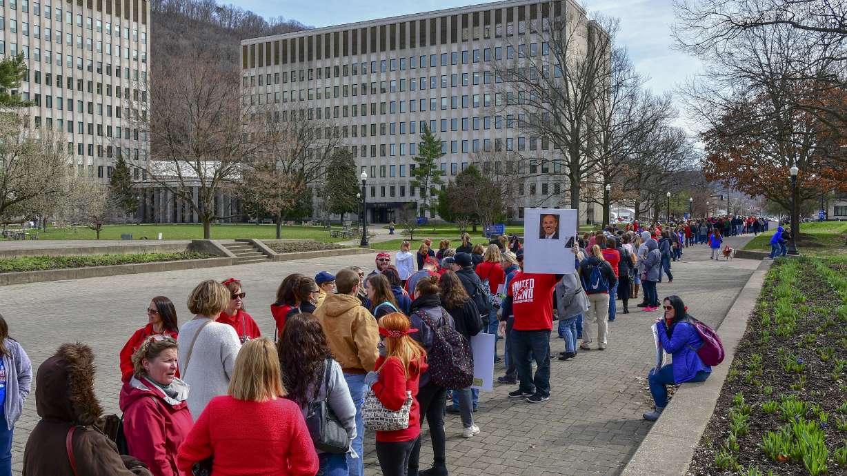 West Virginia teachers cheer pay hike deal to end walkout