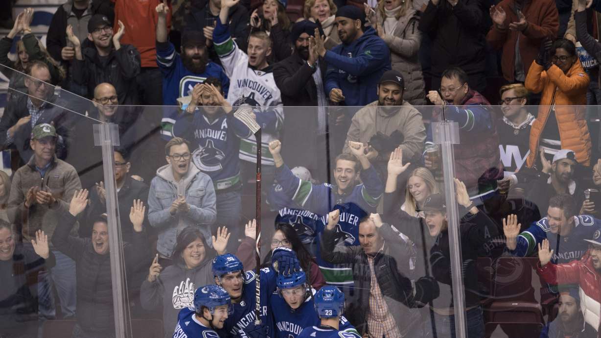 Boeser hospitalized in Canucks' 4-3 OT win over Islanders