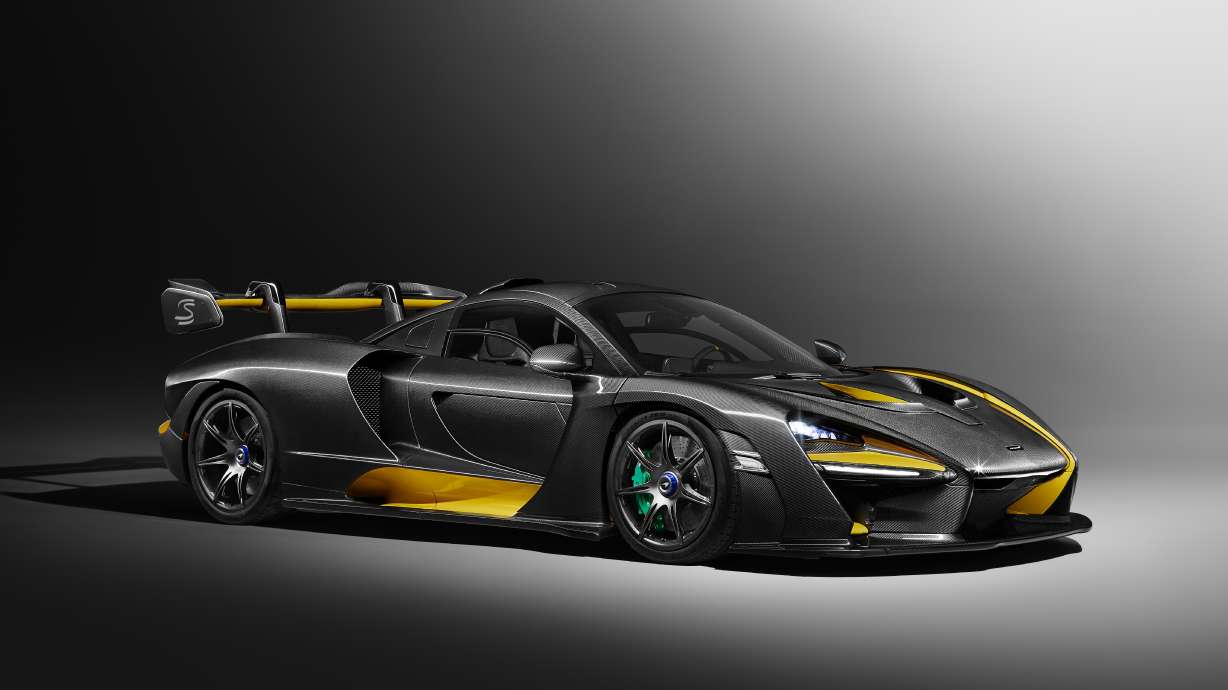 The Latest: Aston Martin combines luxury and electric power