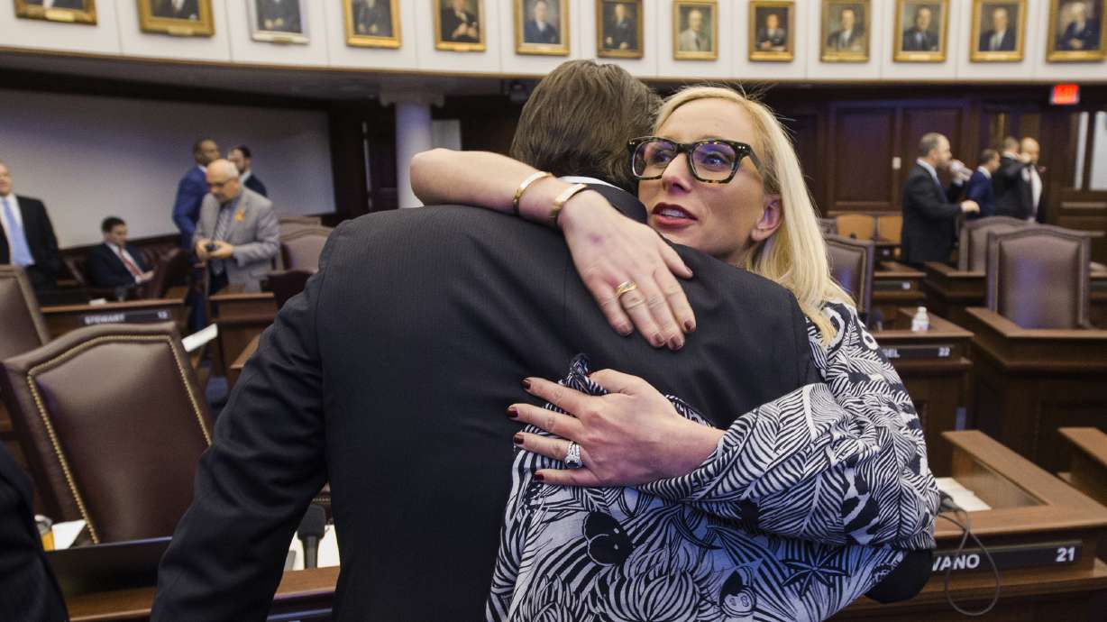 The Latest: Shooting victim plans to sue county, school