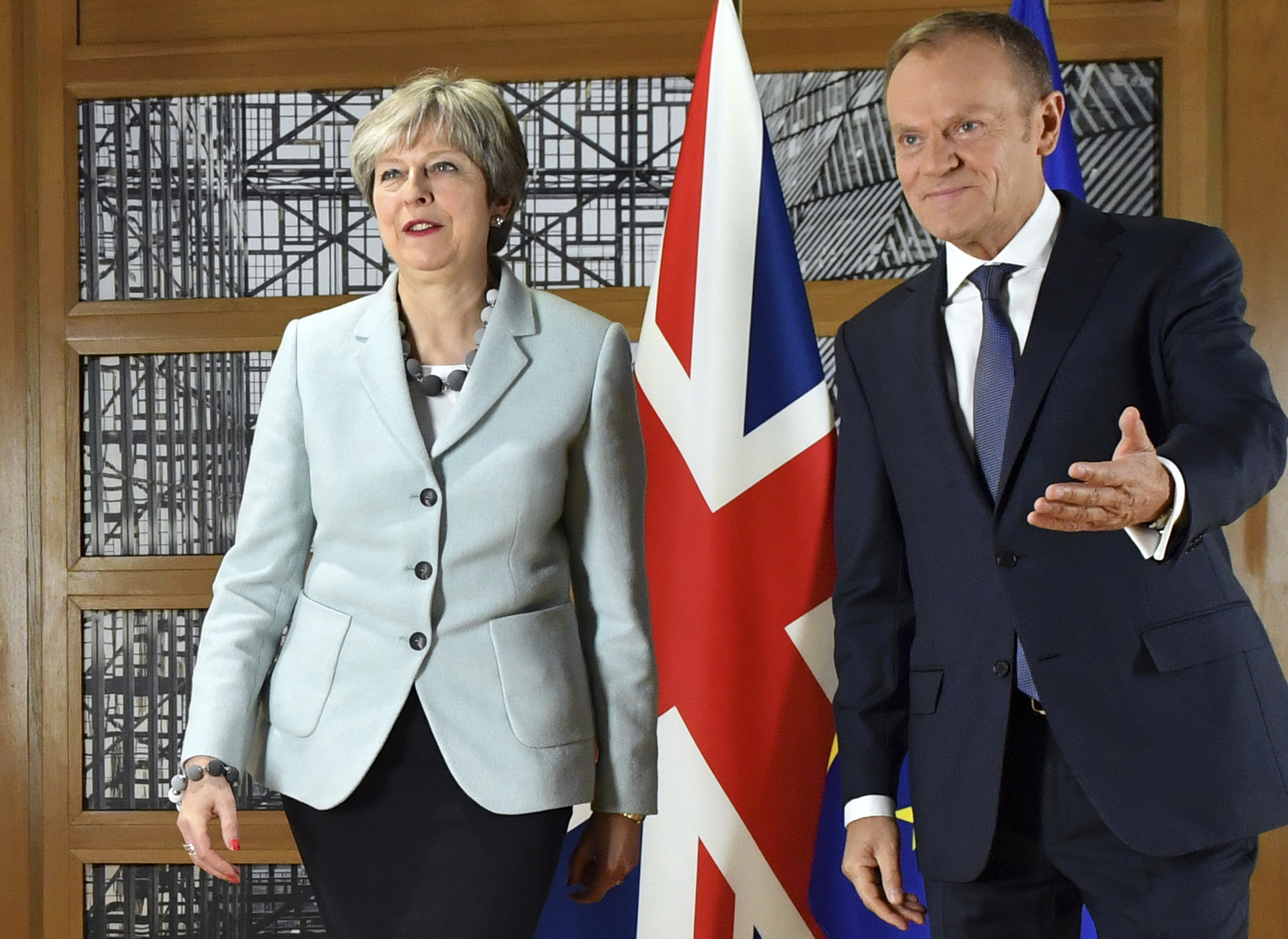 The Latest: UK urges Brexit deal to include financial sector