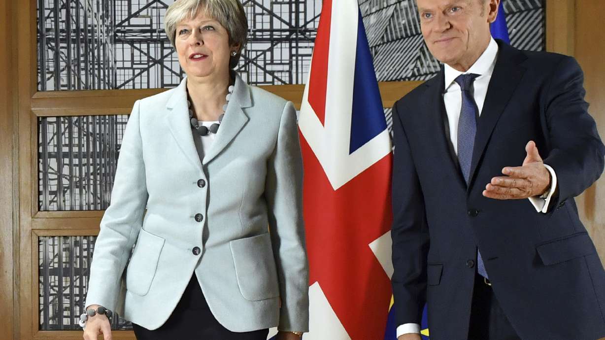 The Latest: UK urges Brexit deal to include financial sector