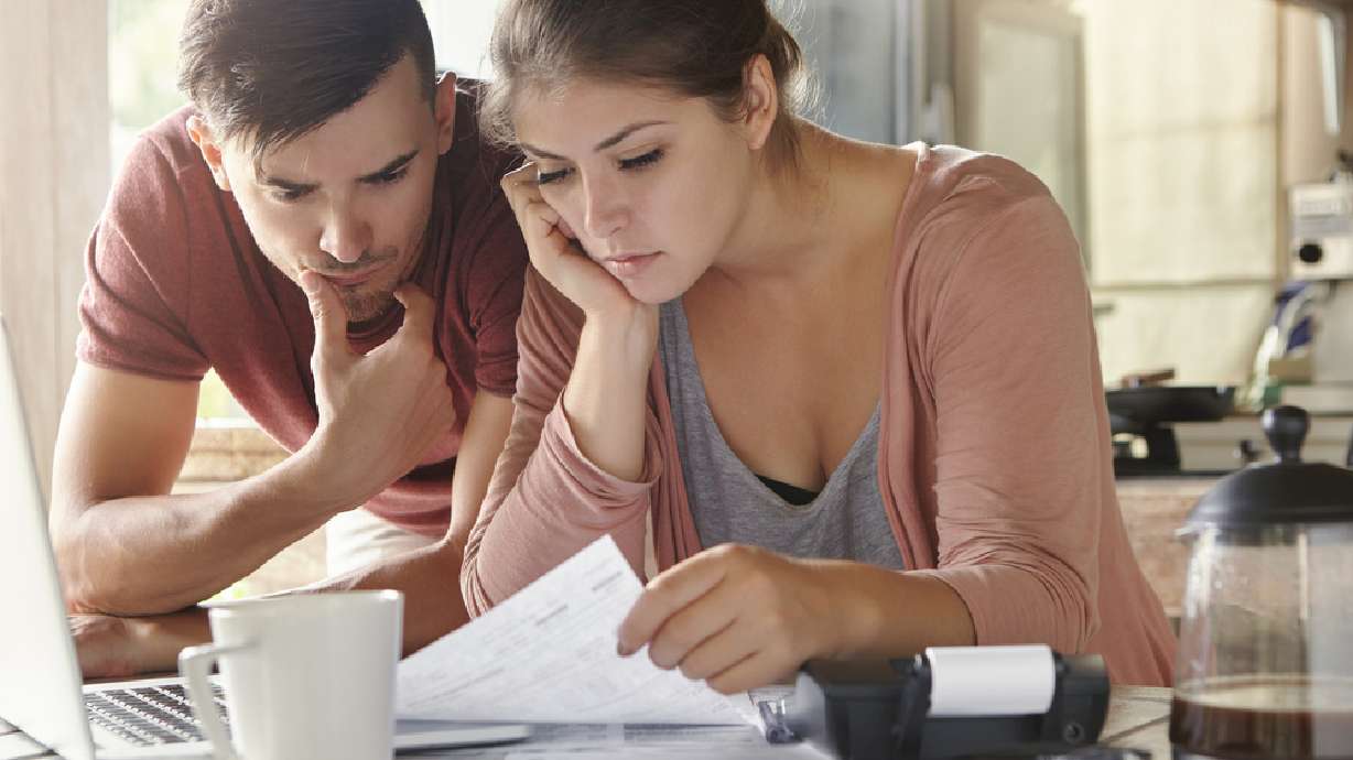 Should I pay off my debt or save for emergencies first?