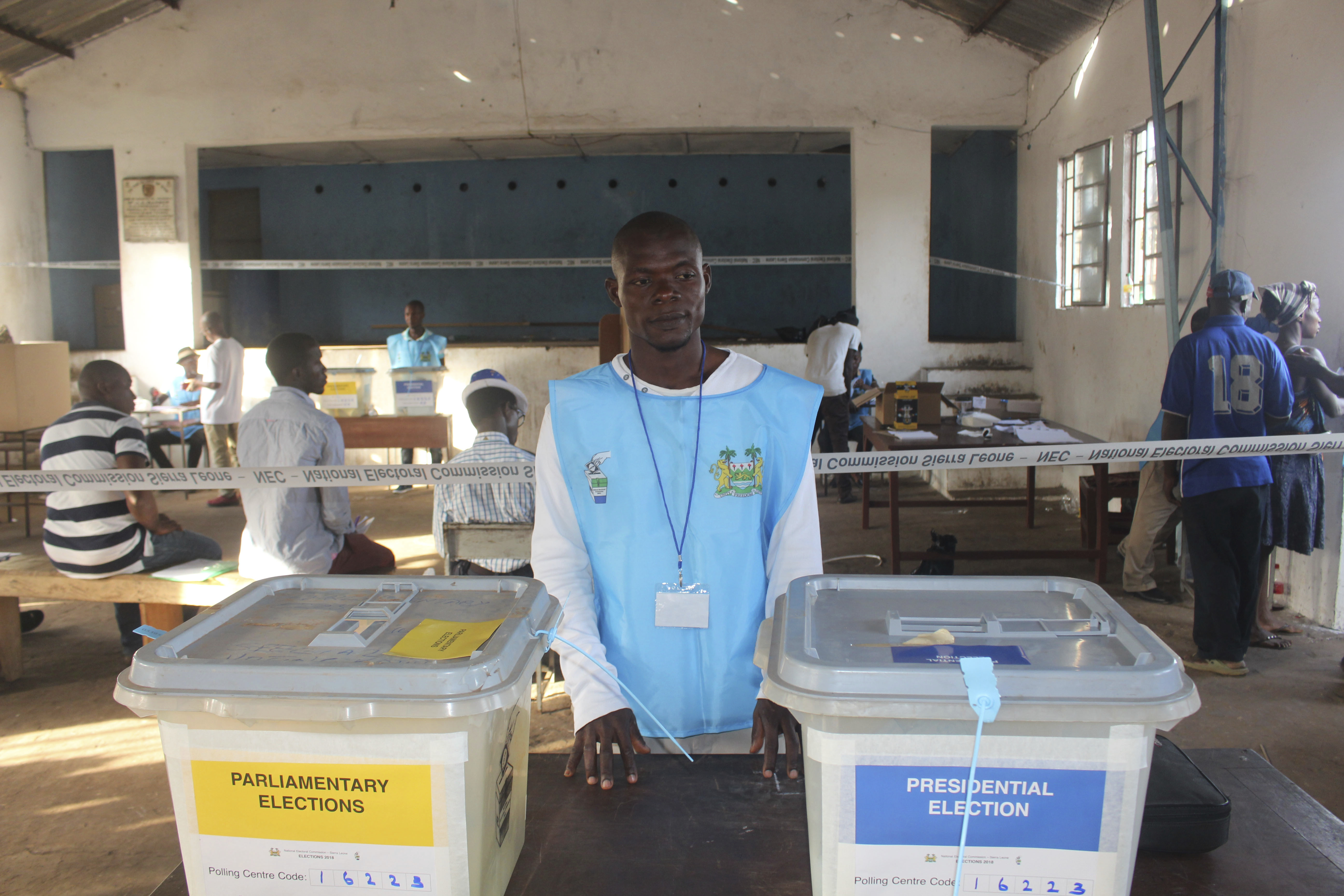 The Latest: Clashes break out in Sierra Leone on voting day