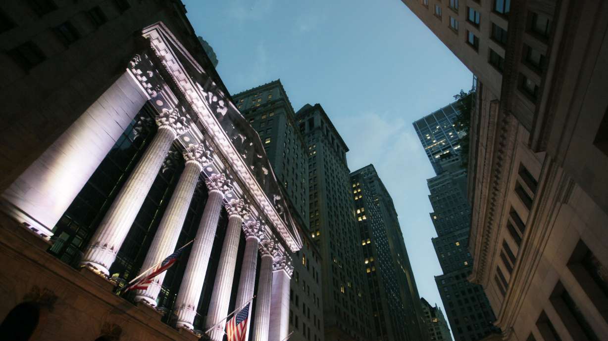 Markets Right Now: Stocks end a choppy day higher