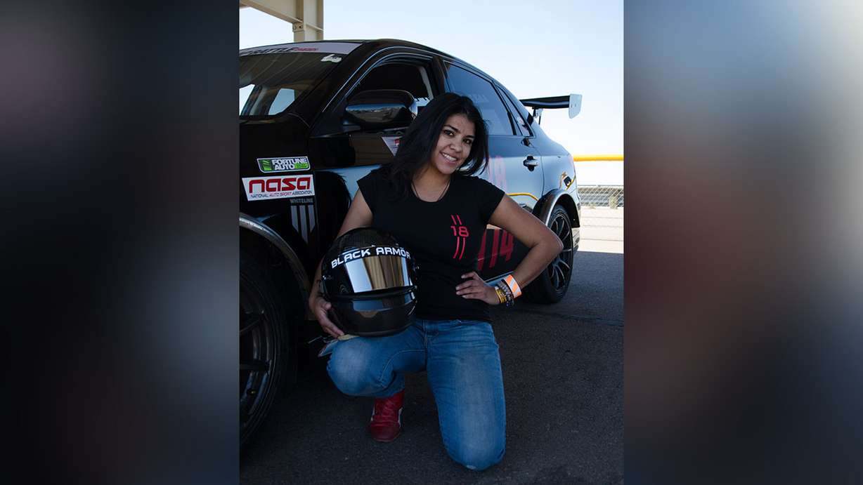 Jamie Moreno, 32, poses in front of her Subaru Impreza WRX. (Photo: Nathan Rushton)