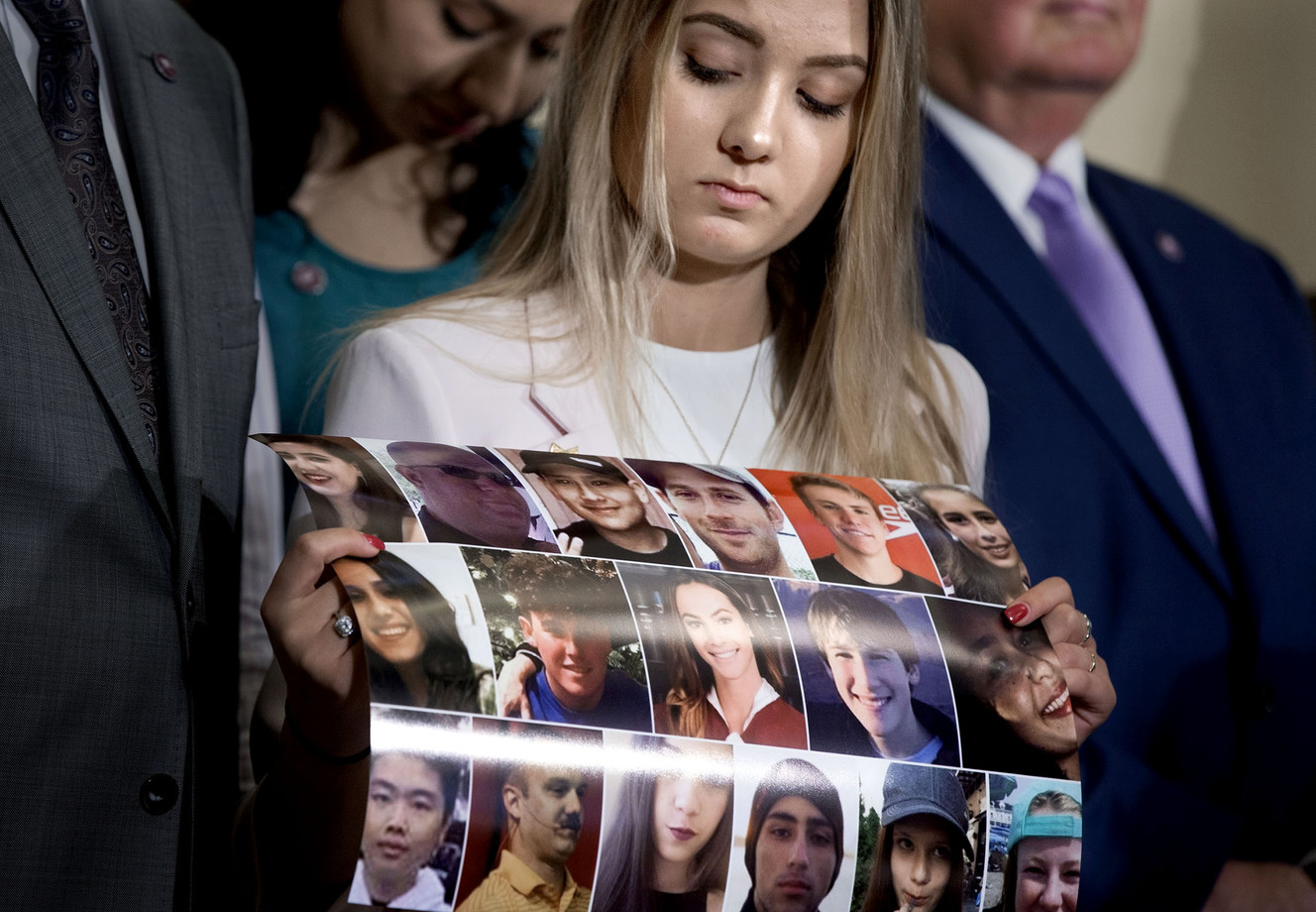 Meghan Petty holds a photograph of the 17 people killed in the shooting at Marjory Stoneman Douglas High School — including her sister, Alaina — during a press conference at the Capitol in Salt Lake City on Thursday, March 8, 2018. Utah lawmakers passed a resolution honoring the victims of the shooting by designating April as #MSDkindness month. HCR22 encourages Utahns to do random act of kindness during April and challenges other states to do the same for another month this year. (Photo: Laura Seitz, KSL)