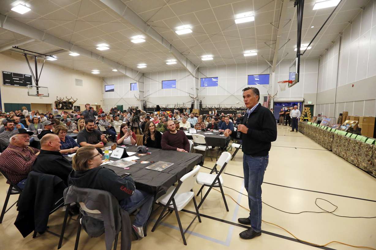 In this Friday, March 2, 2018, photo, shows Mitt Romney speaking to a group at the Sportsmen for Fish and Wildlife Banquet, in Blanding, Utah. The former Republican presidential nominee continues his bid to become a U.S. Senator for Utah. (AP Photo/Rick Bowmer)