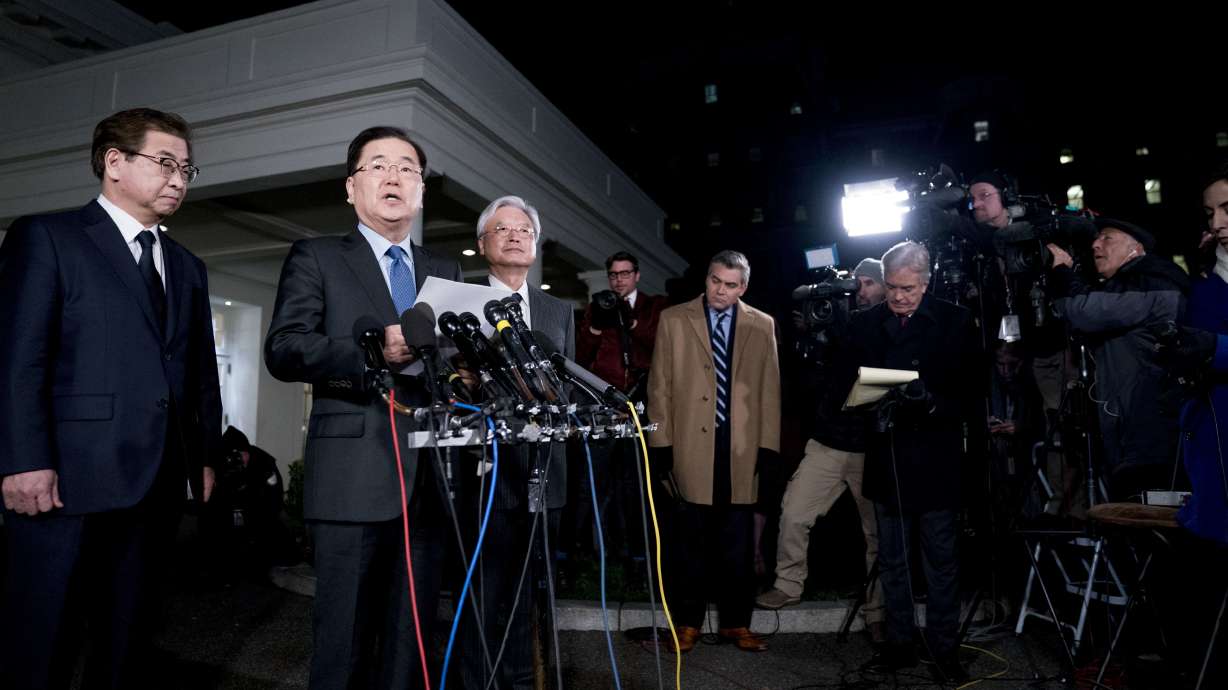 Trump teases big news; it arrives in the dark, on driveway