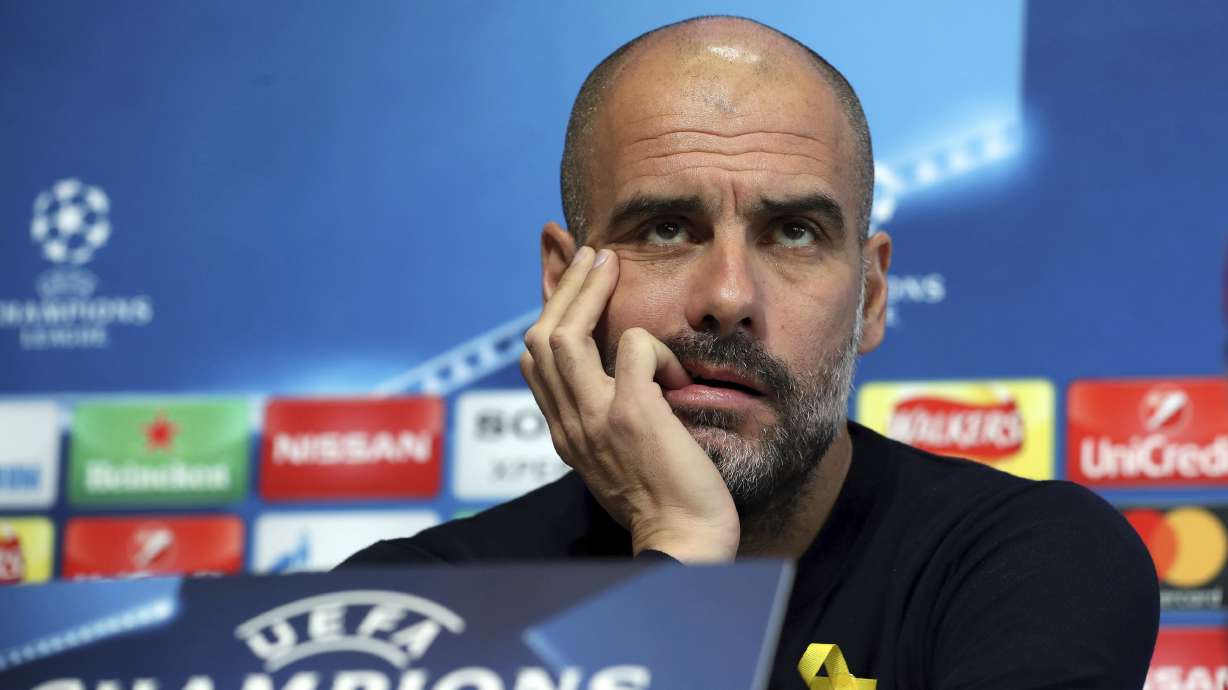 FA fines Guardiola for ribbon backing Catalan politicians