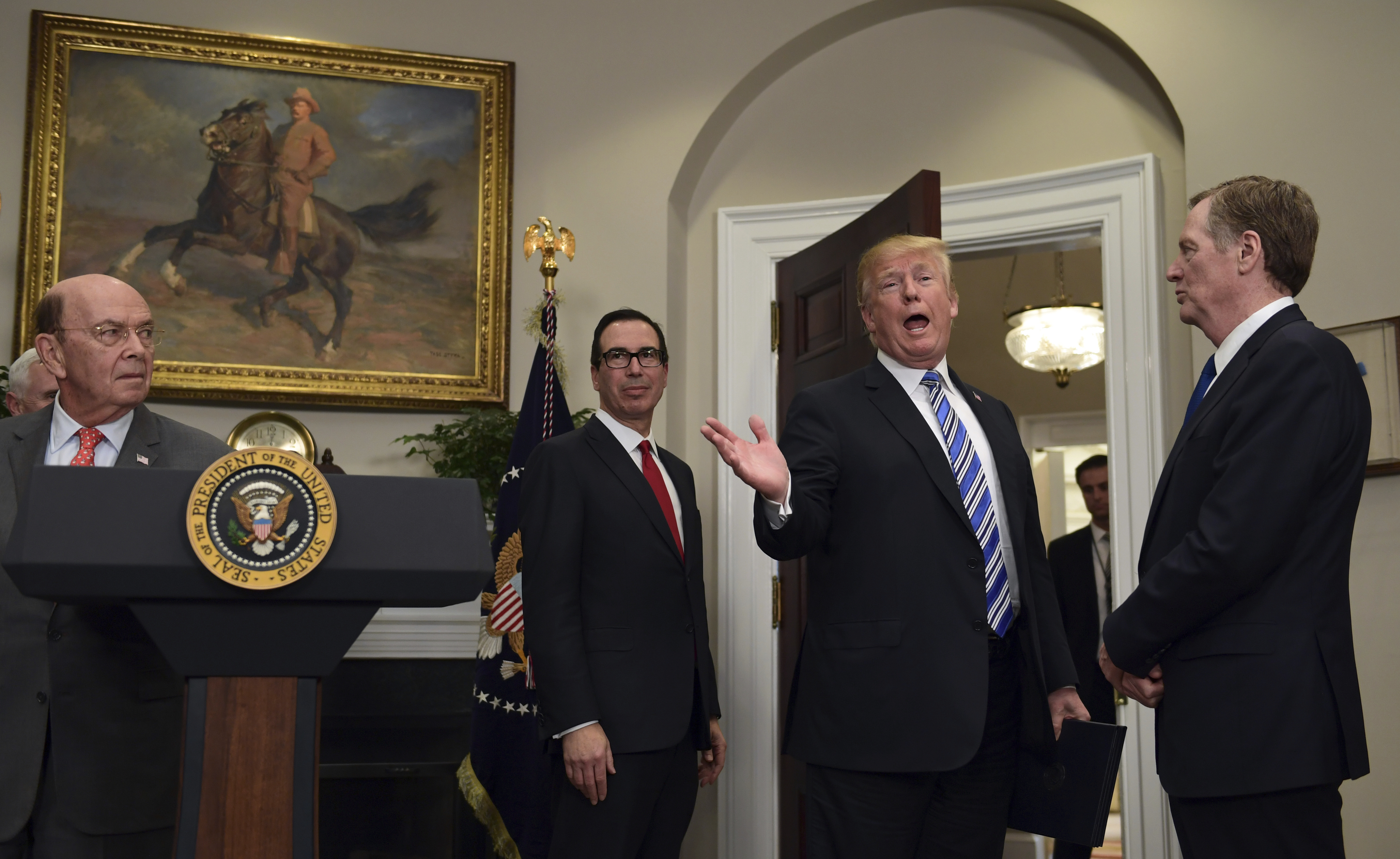 The Latest: Trump talks tariffs with Australia's Turnbull