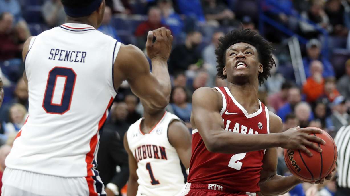 Sexton leads Alabama's 2nd-half surge to beat No. 16 Auburn