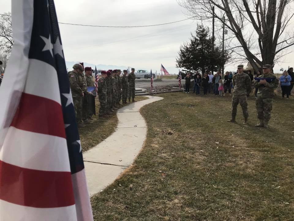 About 25 soldiers in green-brown camouflage gather outside the Tremonton home of Talan Summers on Friday, March 9, 2018. They were there to surprise him. He has always wanted to join the military, but due to a rare disease where he's constantly in pain, he couldn't. (Photo: Meghan Thackrey, KSL)